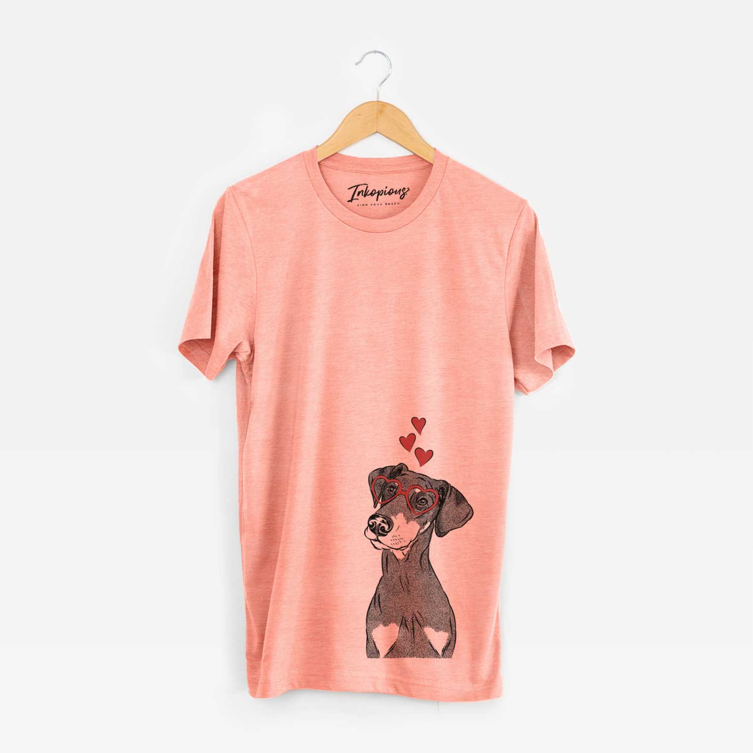 Hand-drawn sketch of Iroh the Doberman Pinscher wearing heart-shaped glasses on a Sunset Unisex crewneck