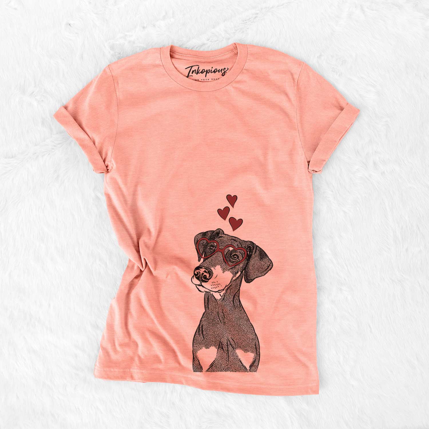 Hand-drawn sketch of Iroh the Doberman Pinscher wearing heart-shaped glasses on a Sunset Bella Canvas Unisex Crewneck