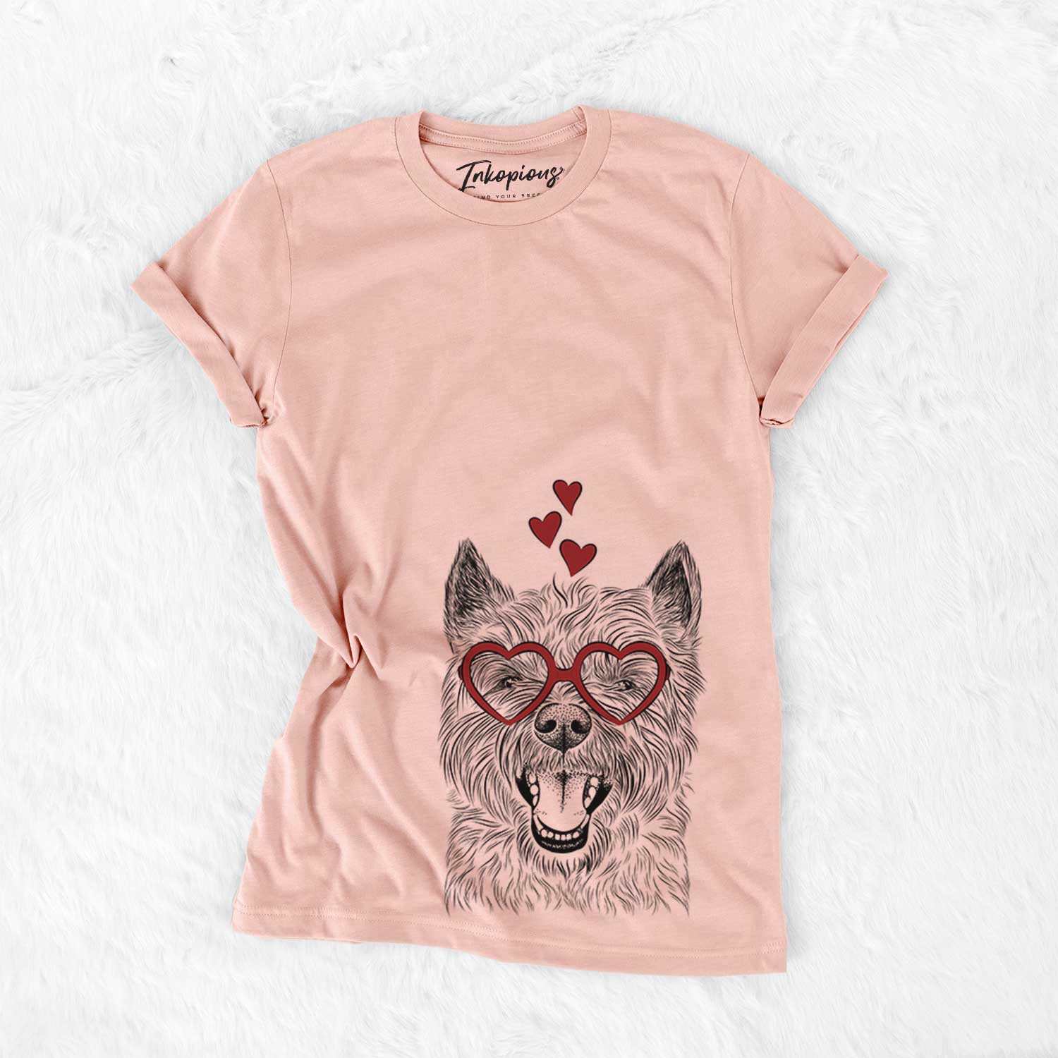 Hand-drawn sketch of Jeff the Cairn Terrier wearing heart-shaped glasses on a Peach Bella Canvas Unisex Crewneck