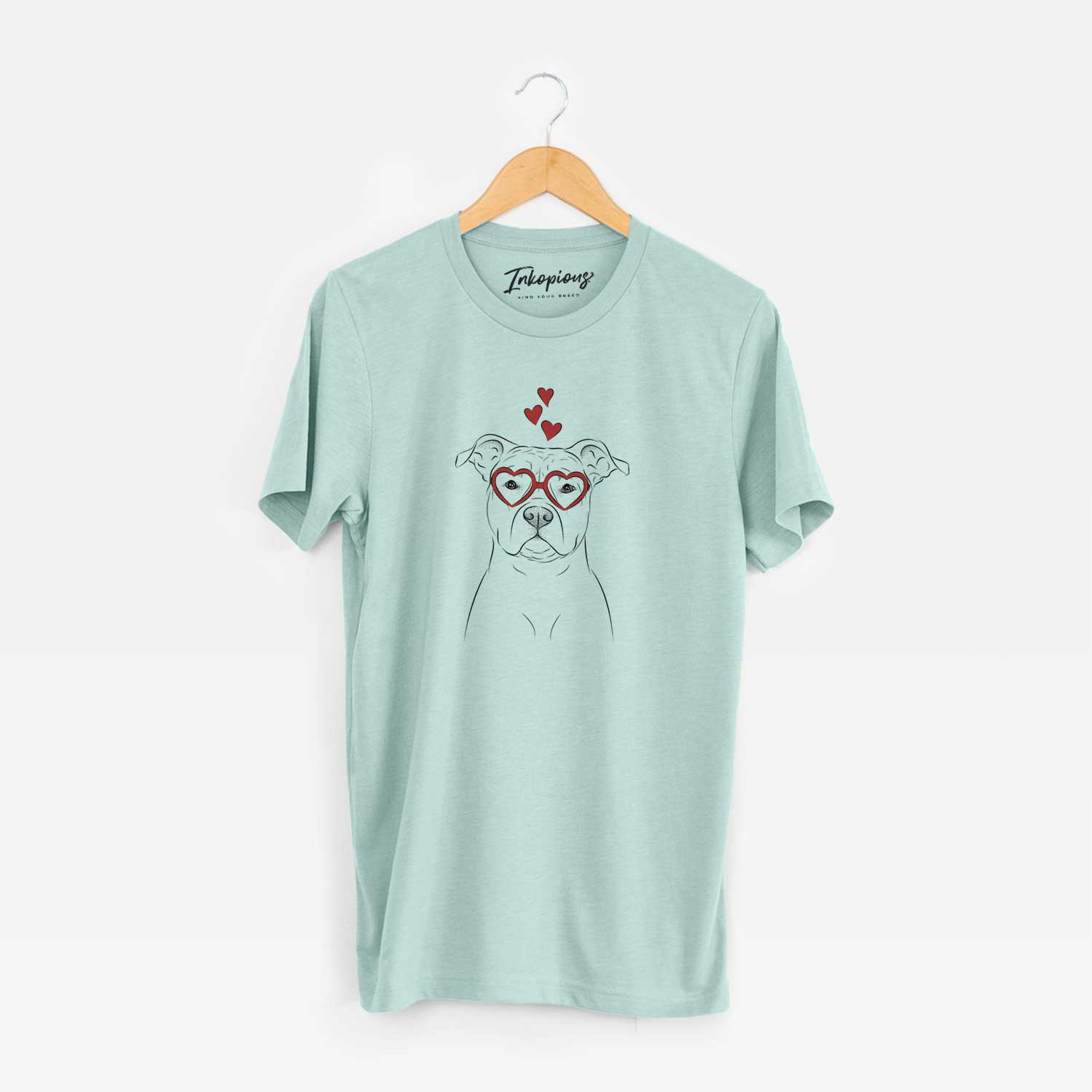 Hand-drawn sketch of Jethro the American Staffordshire Terrier wearing heart-shaped glasses on a Heather Sage Unisex crewneck