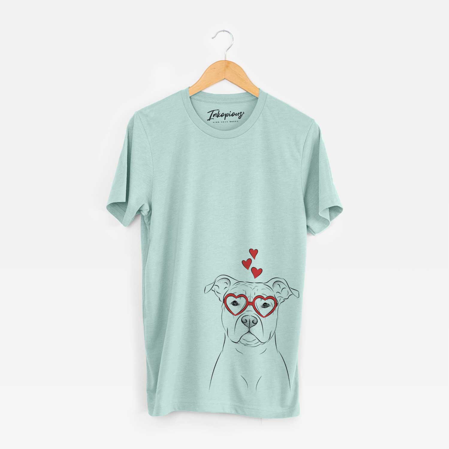 Hand-drawn sketch of Jethro the American Staffordshire Terrier wearing heart-shaped glasses on a Heather Sage Unisex crewneck