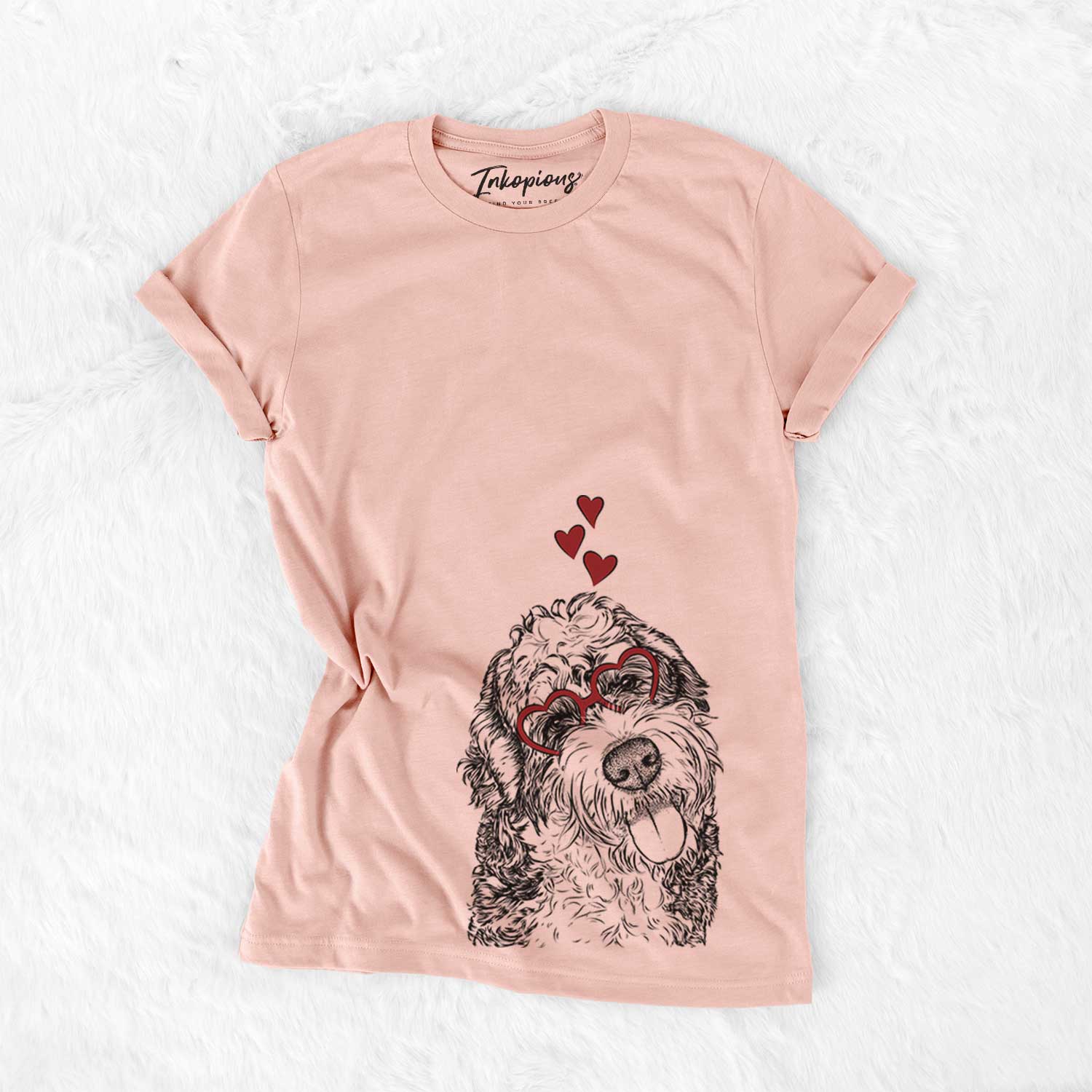 Hand-drawn sketch of Kaci the Bernedoodle wearing heart-shaped glasses on a Peach Bella Canvas Unisex Crewneck