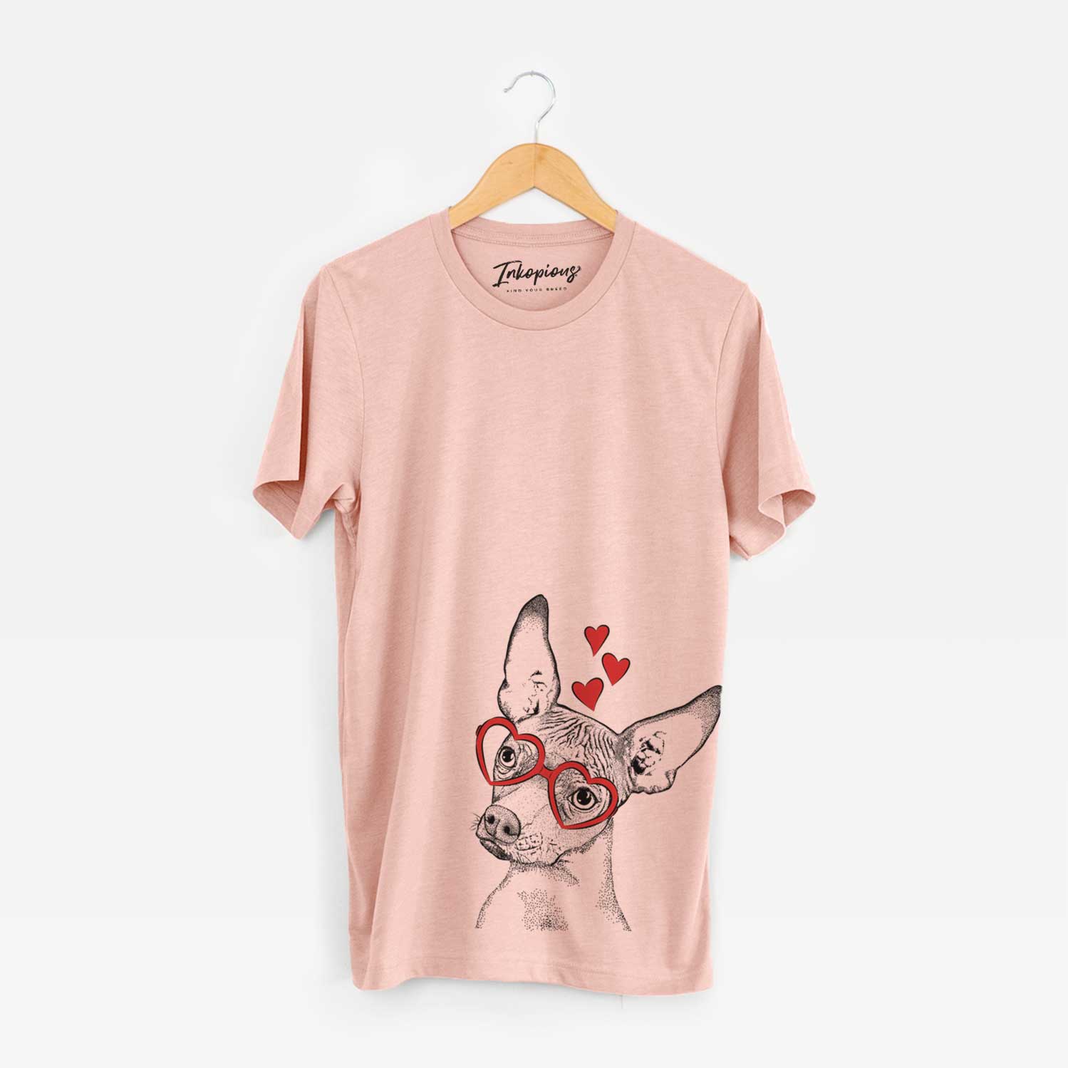 Hand-drawn sketch of Kahlo the Xoloitzcuintli wearing heart-shaped glasses on a Peach Unisex crewneck