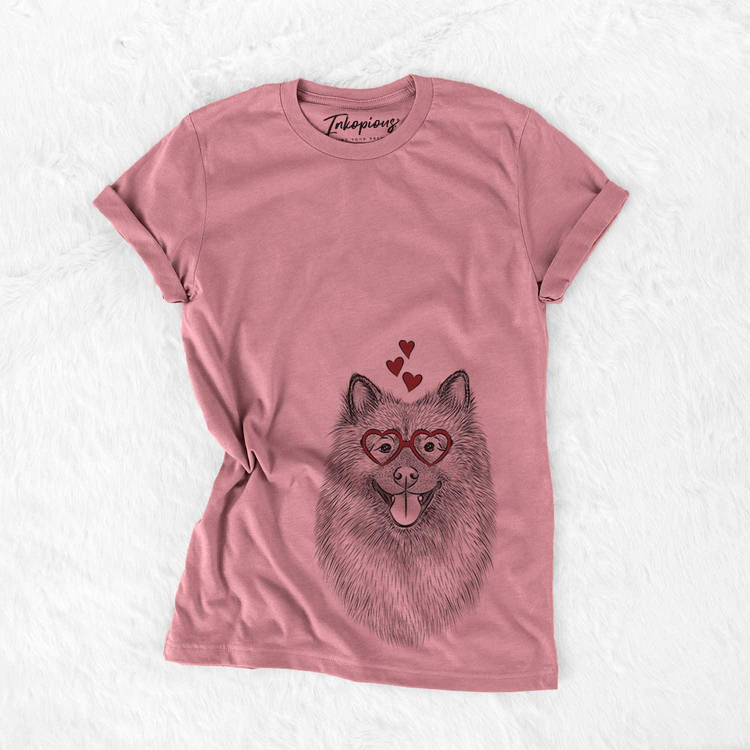 Hand-drawn sketch of Kai the Keeshond wearing heart-shaped glasses on a Mauve Bella Canvas Unisex Crewneck