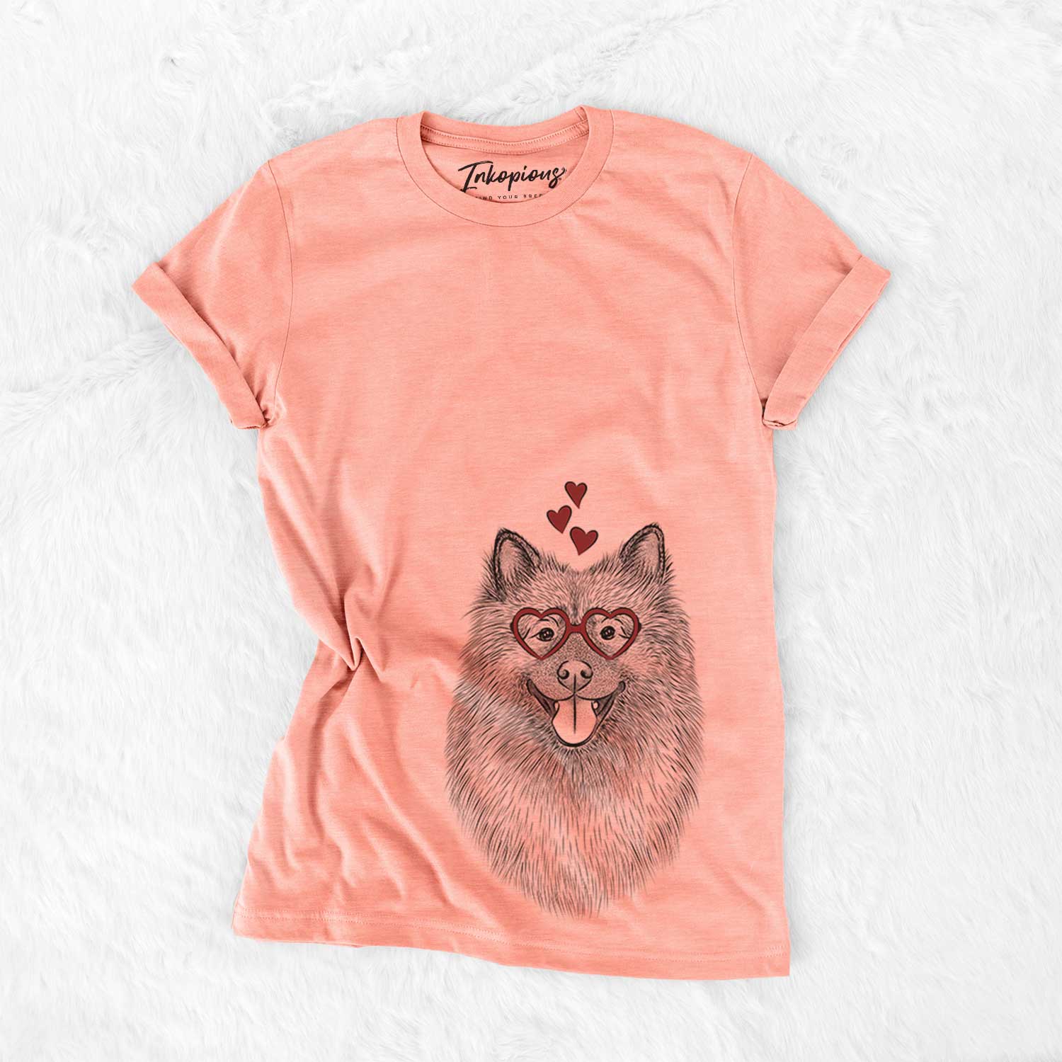 Hand-drawn sketch of Kai the Keeshond wearing heart-shaped glasses on a Sunset Bella Canvas Unisex Crewneck