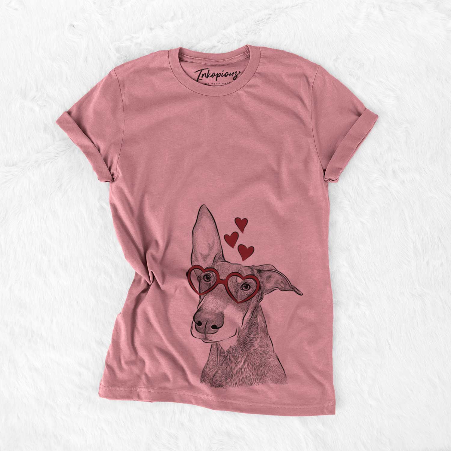 Hand-drawn sketch of Kain the Doberman Pinscher wearing heart-shaped glasses on a Mauve Bella Canvas Unisex Crewneck