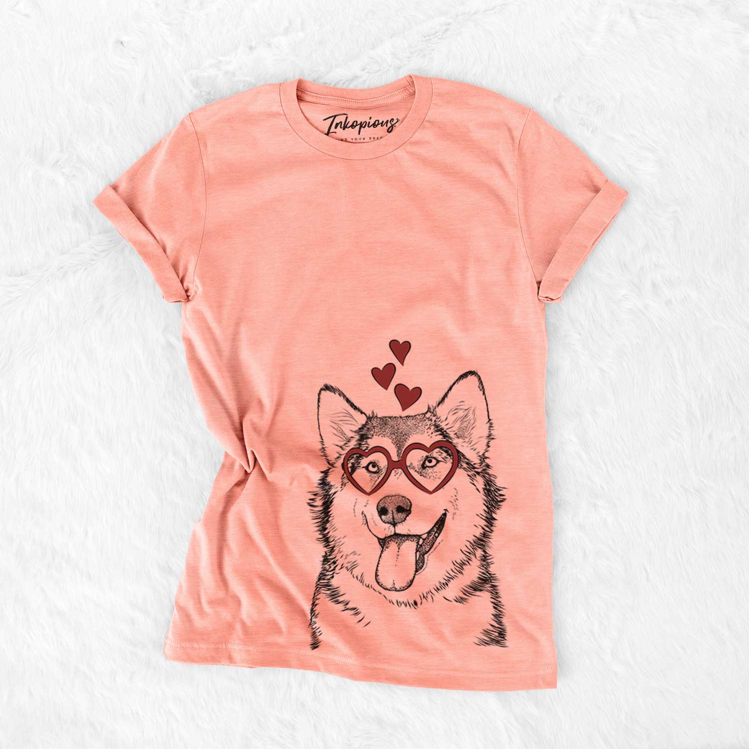 Hand-drawn sketch of Kaskae the Malamute wearing heart-shaped glasses on a Sunset Bella Canvas Unisex Crewneck