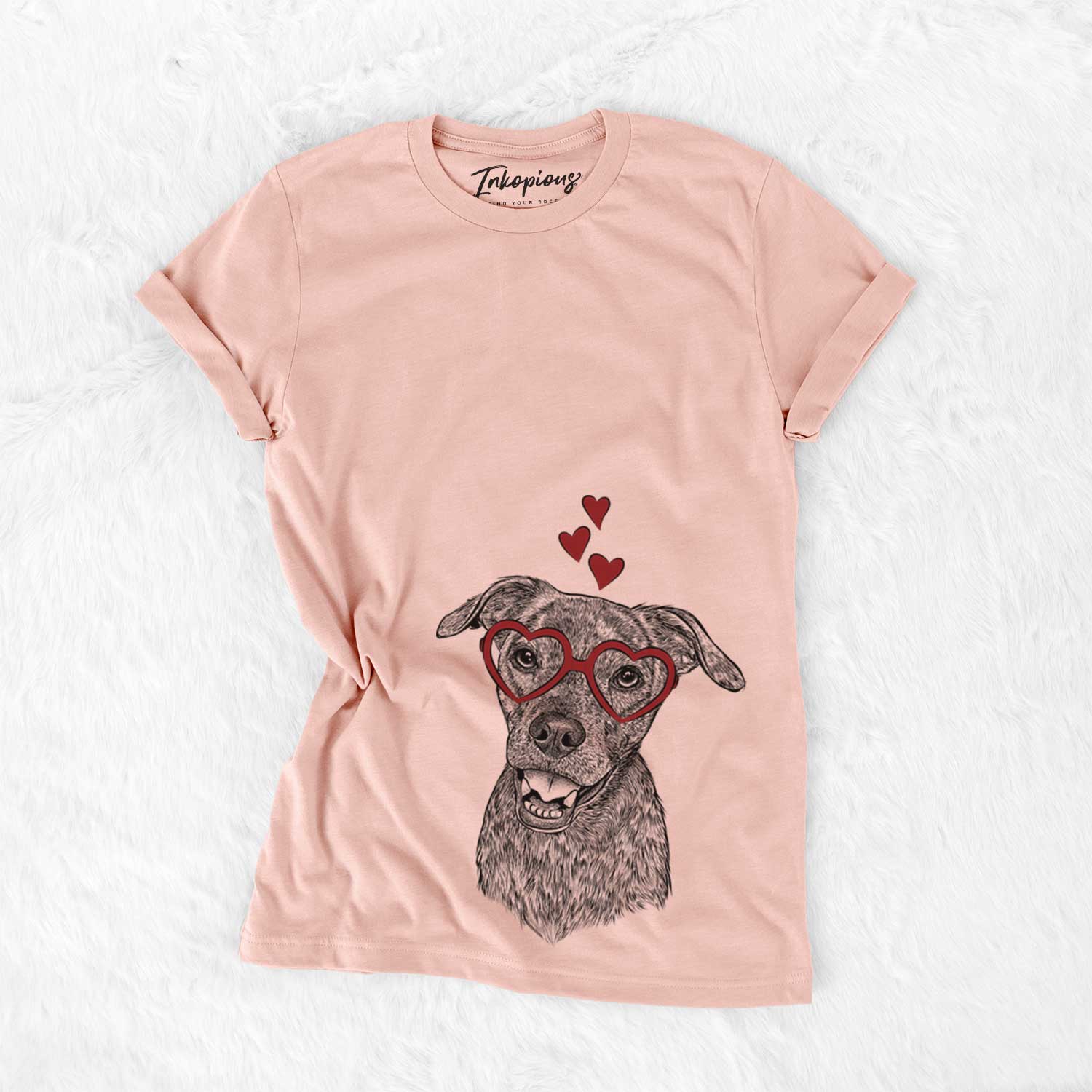 Hand-drawn sketch of Kirby the Mountain Cur Mix wearing heart-shaped glasses on a Peach Bella Canvas Unisex Crewneck