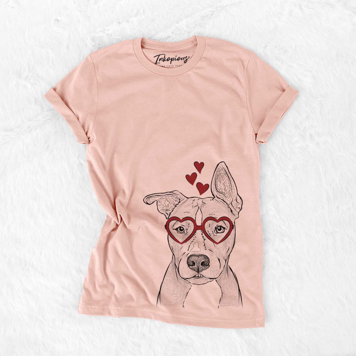 Hand-drawn sketch of Kisses the Pitbull wearing heart-shaped glasses on a Peach Bella Canvas Unisex Crewneck