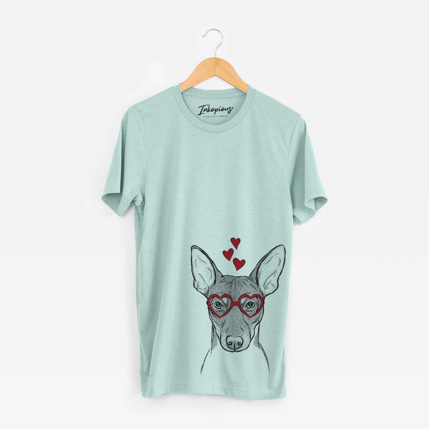 Hand-drawn sketch of Knox the Rat Terrier wearing heart-shaped glasses on a Heather Sage Bella Canvas Unisex Crewneck
