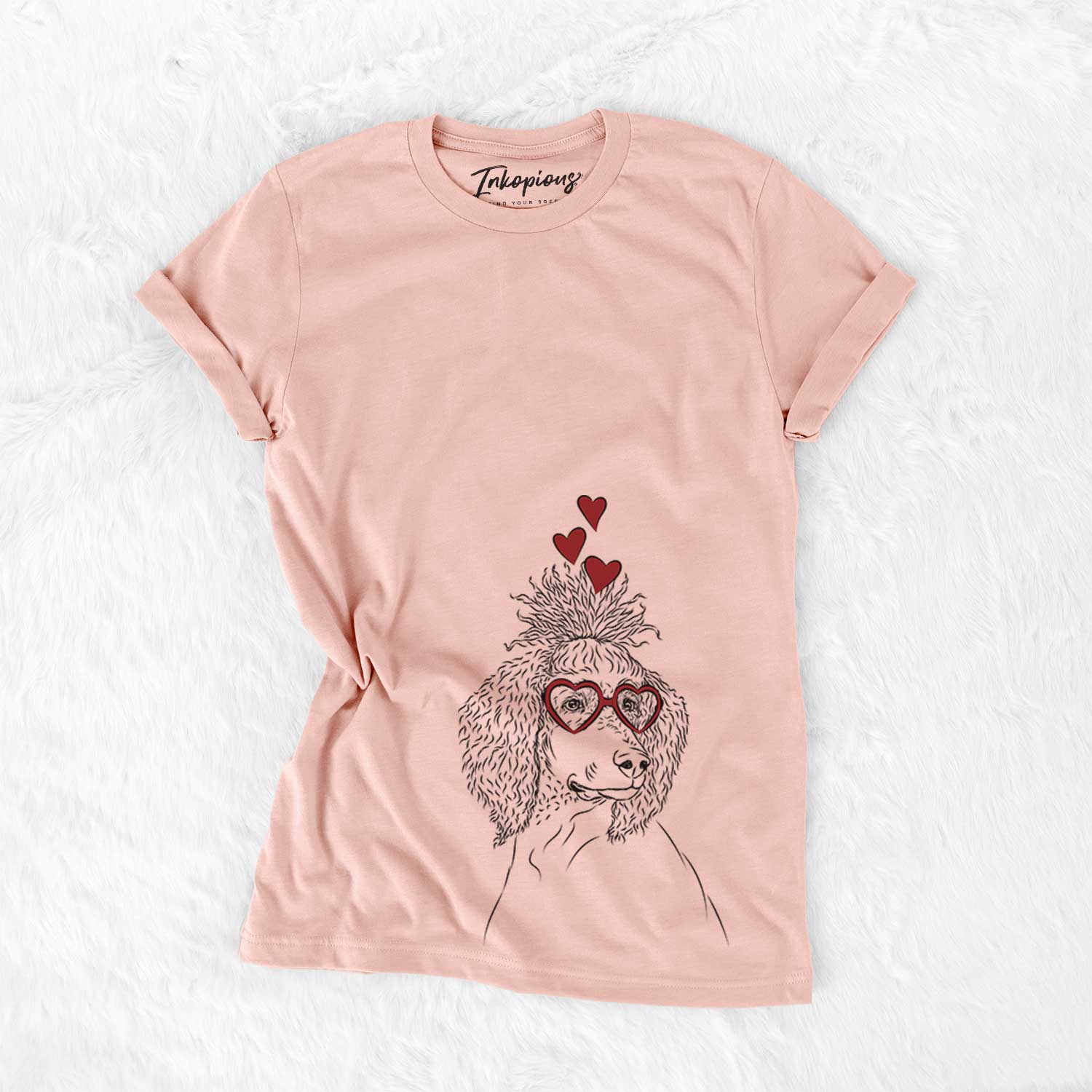 Hand-drawn sketch of Leo the Poodle wearing heart-shaped glasses on a Peach Bella Canvas Unisex Crewneck