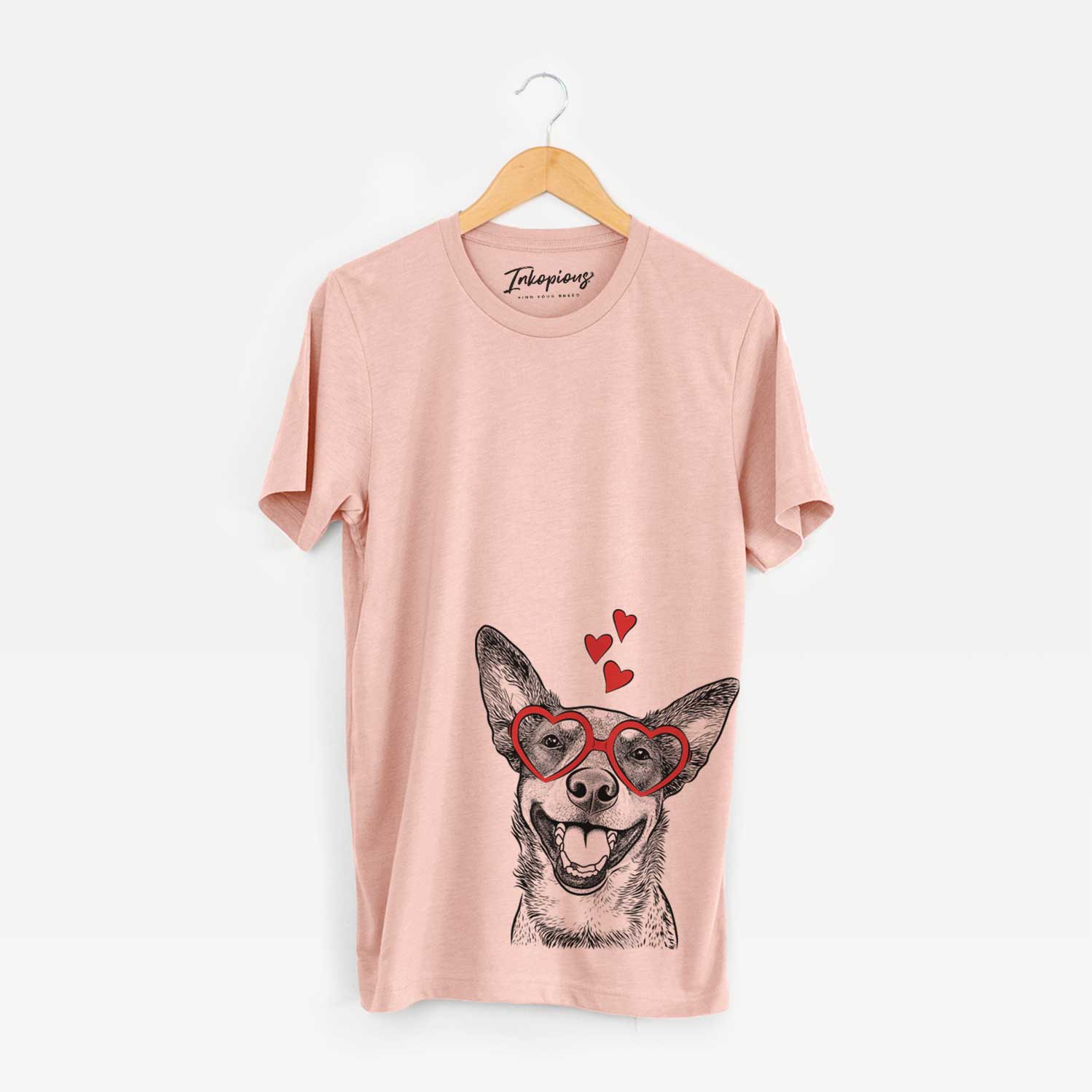 Hand-drawn sketch of Lily the Australian Cattle Dog wearing heart-shaped glasses on a Peach Unisex crewneck