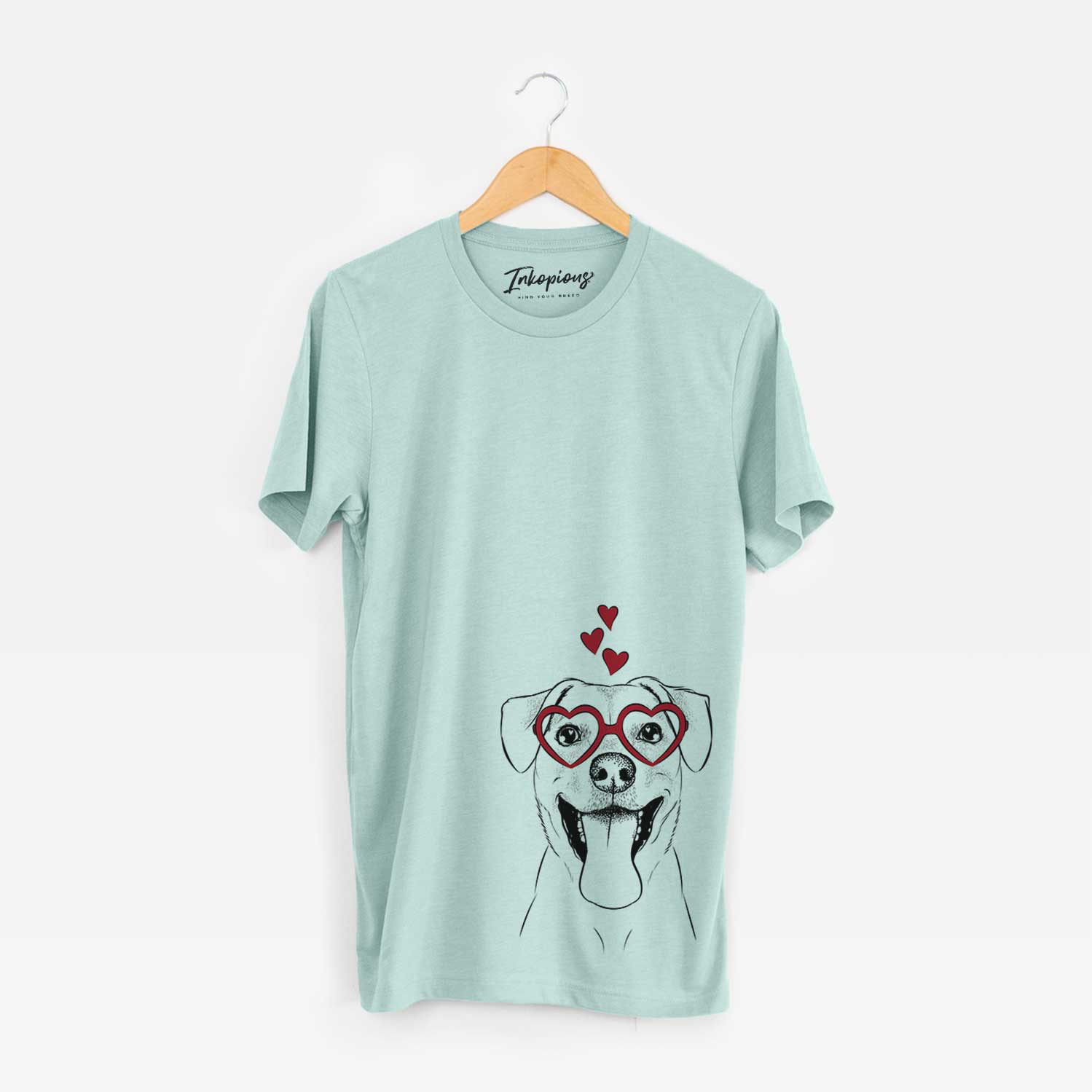 Hand-drawn sketch of Lily Estelle the Mixed Breed wearing heart-shaped glasses on a Heather Sage Bella Canvas Unisex Crewneck