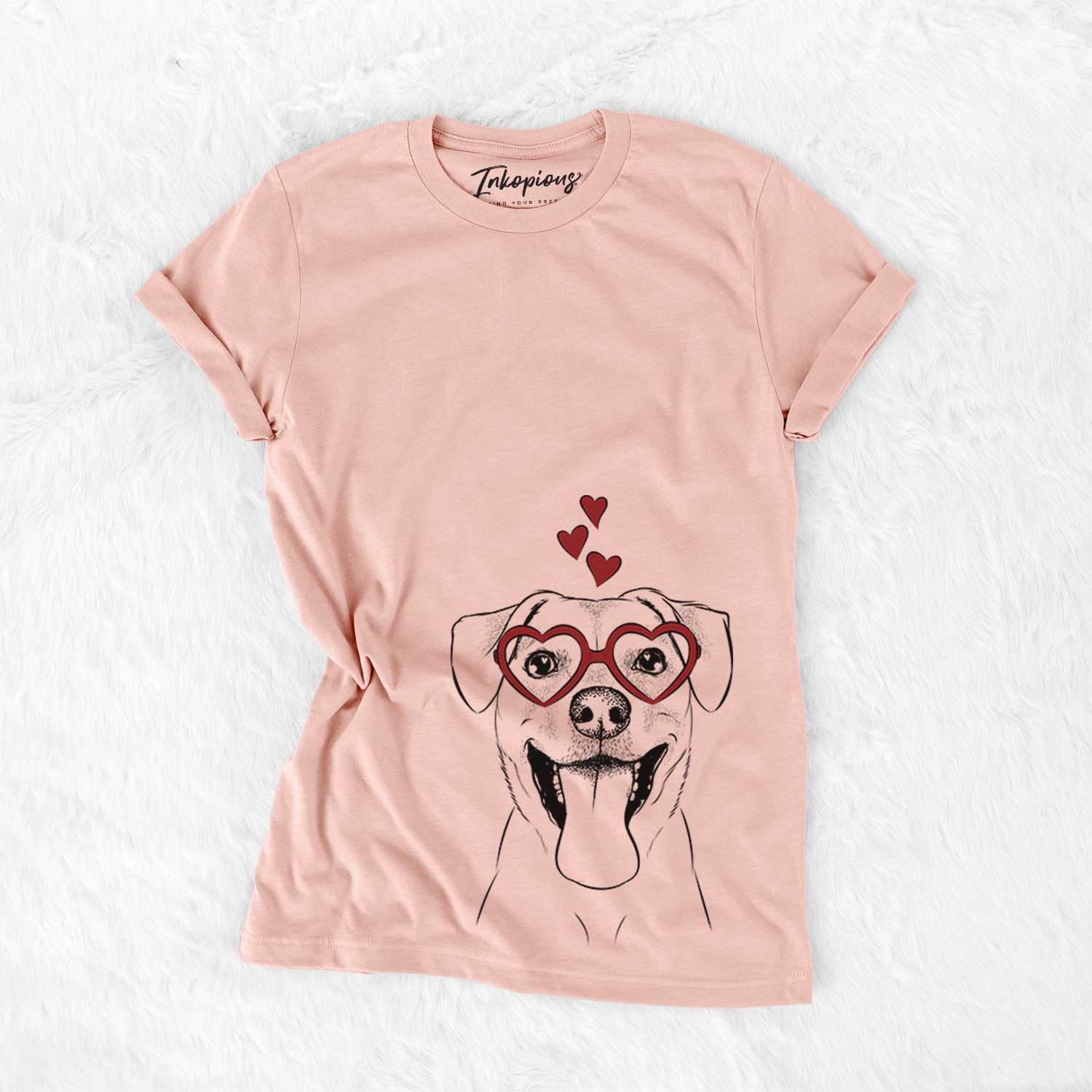 Hand-drawn sketch of Lily Estelle the Mixed Breed wearing heart-shaped glasses on a Peach Bella Canvas Unisex Crewneck