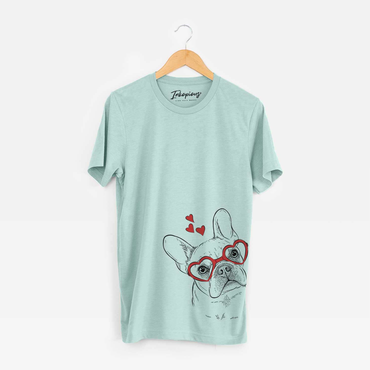 Hand-drawn sketch of Loki the French Bulldog wearing heart-shaped glasses on a Heather Sage Unisex crewneck