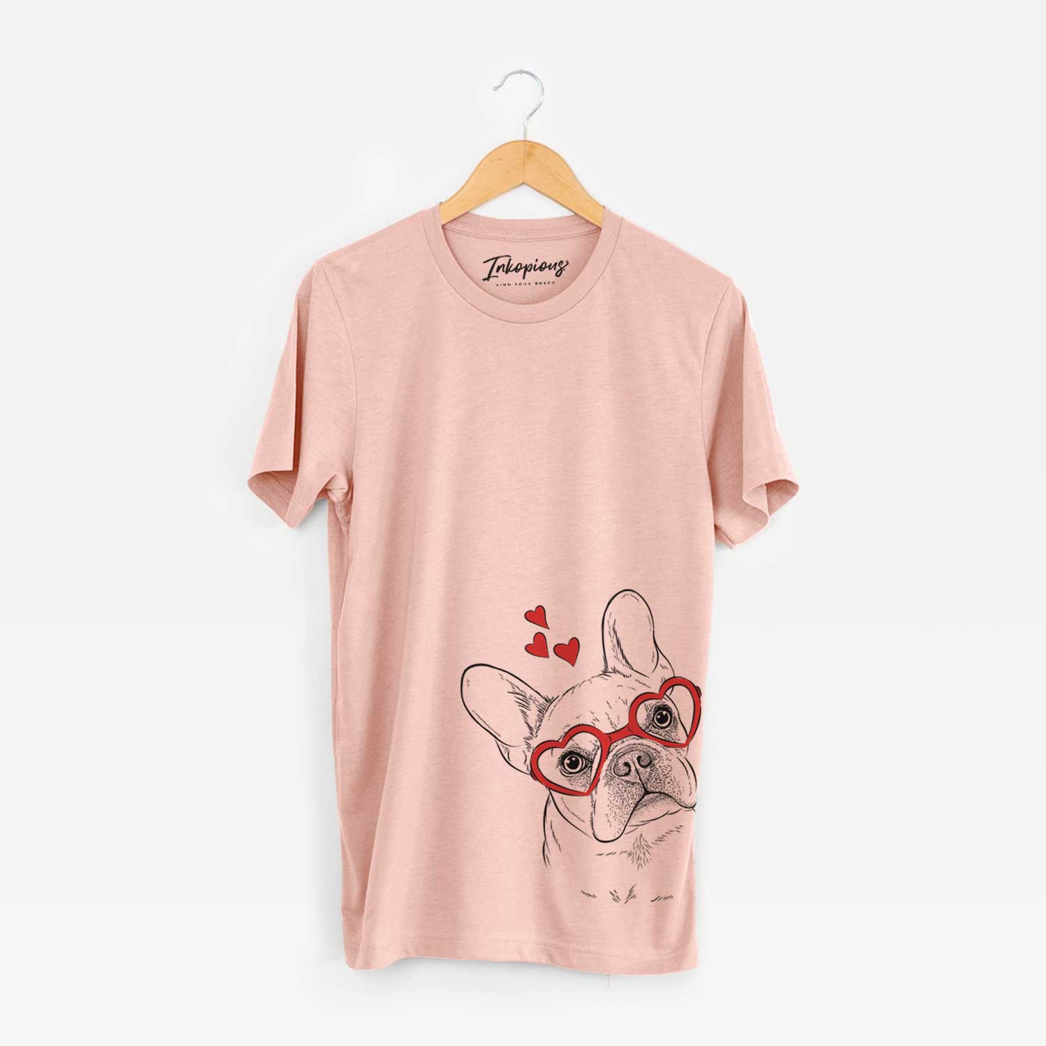 Hand-drawn sketch of Loki the French Bulldog wearing heart-shaped glasses on a Peach Unisex crewneck