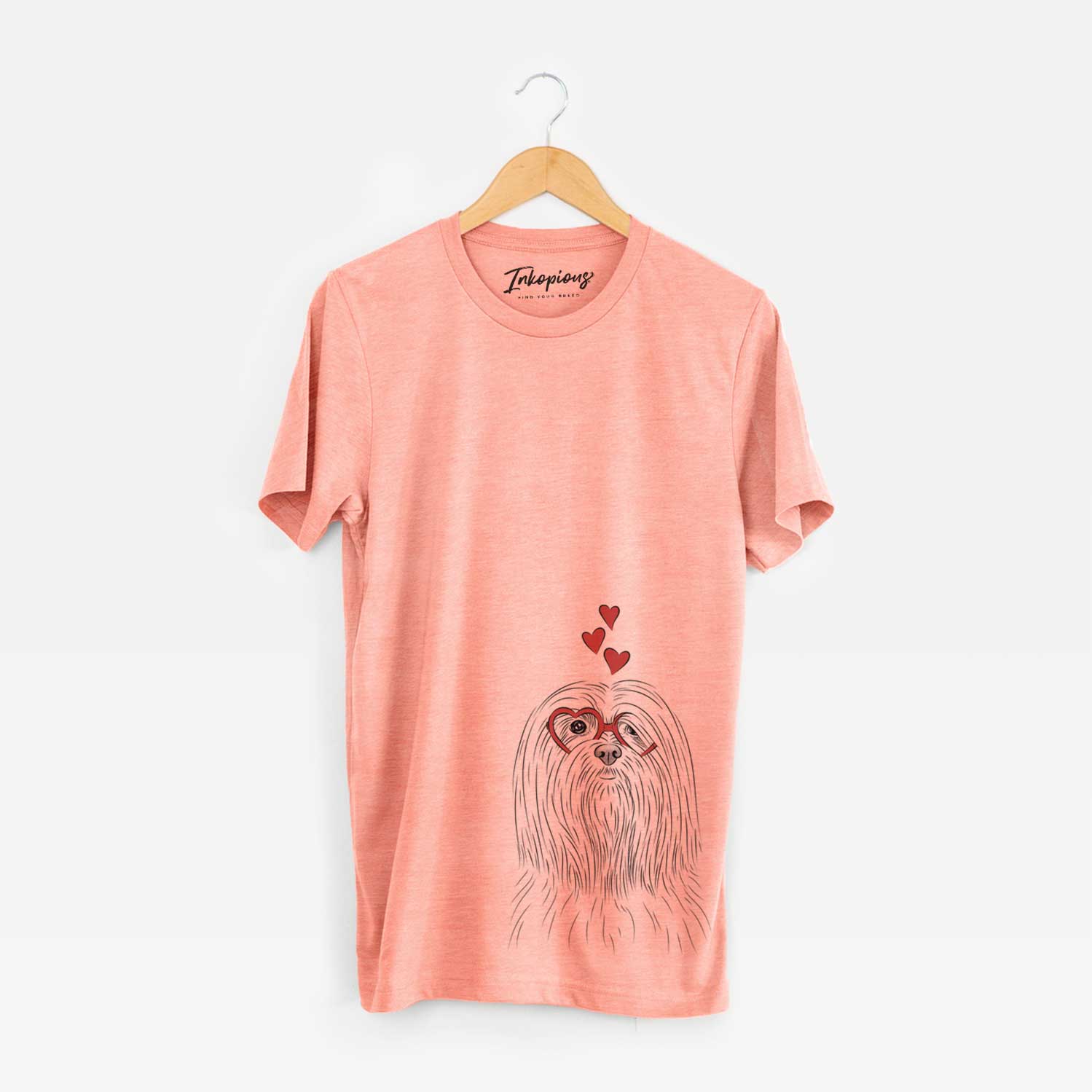 Hand-drawn sketch of Lorenzo the Lhasa Apso wearing heart-shaped glasses on a Sunset Unisex crewneck