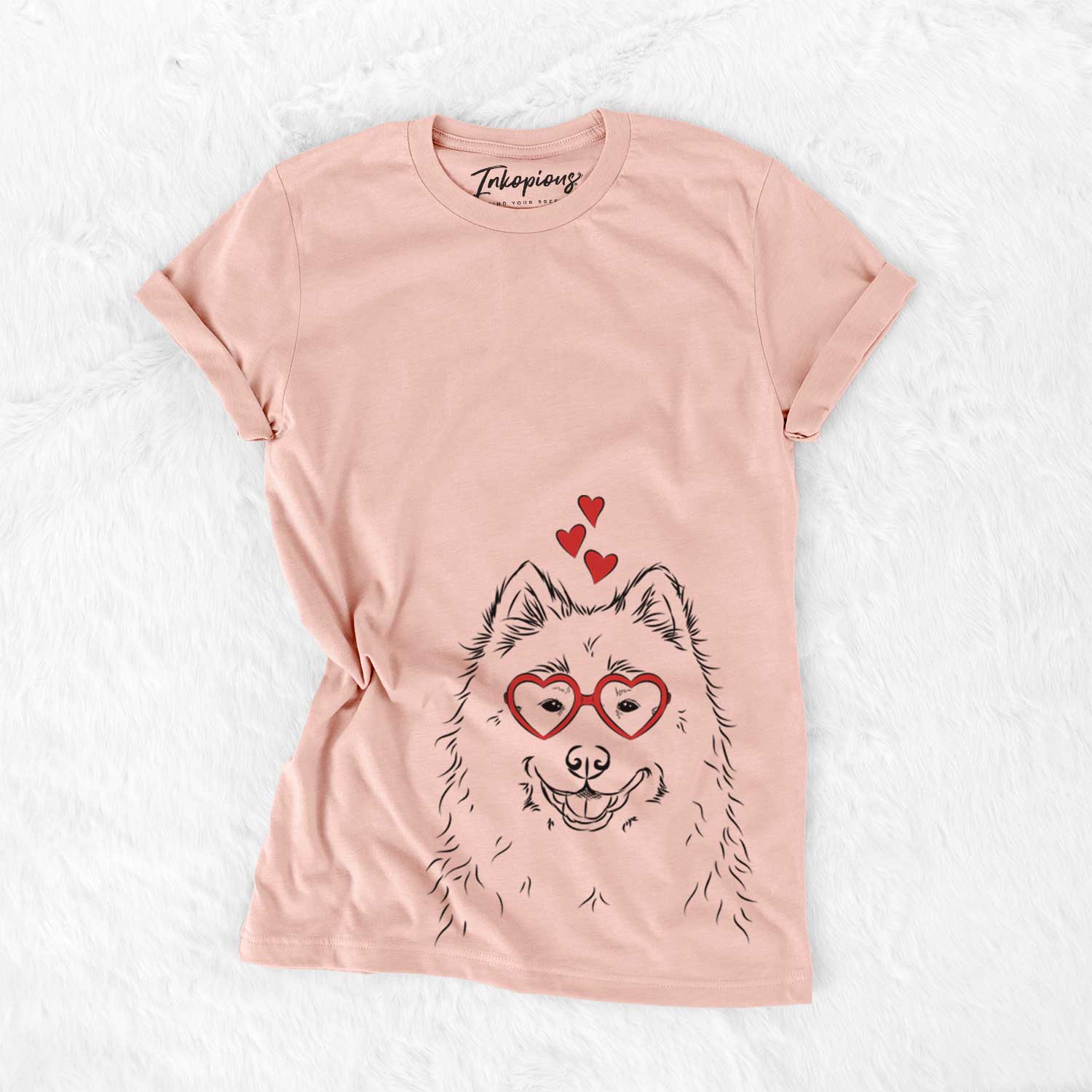 Hand-drawn sketch of Luka the Samoyed wearing heart-shaped glasses on a Peach Bella Canvas Unisex Crewneck