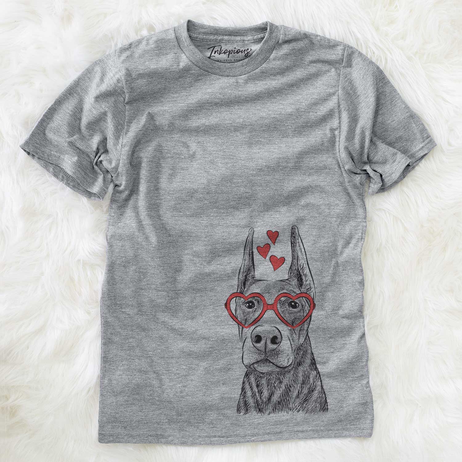 Hand-drawn sketch of Luna the Doberman Pinscher wearing heart-shaped glasses on a Grey Unisex crewneck