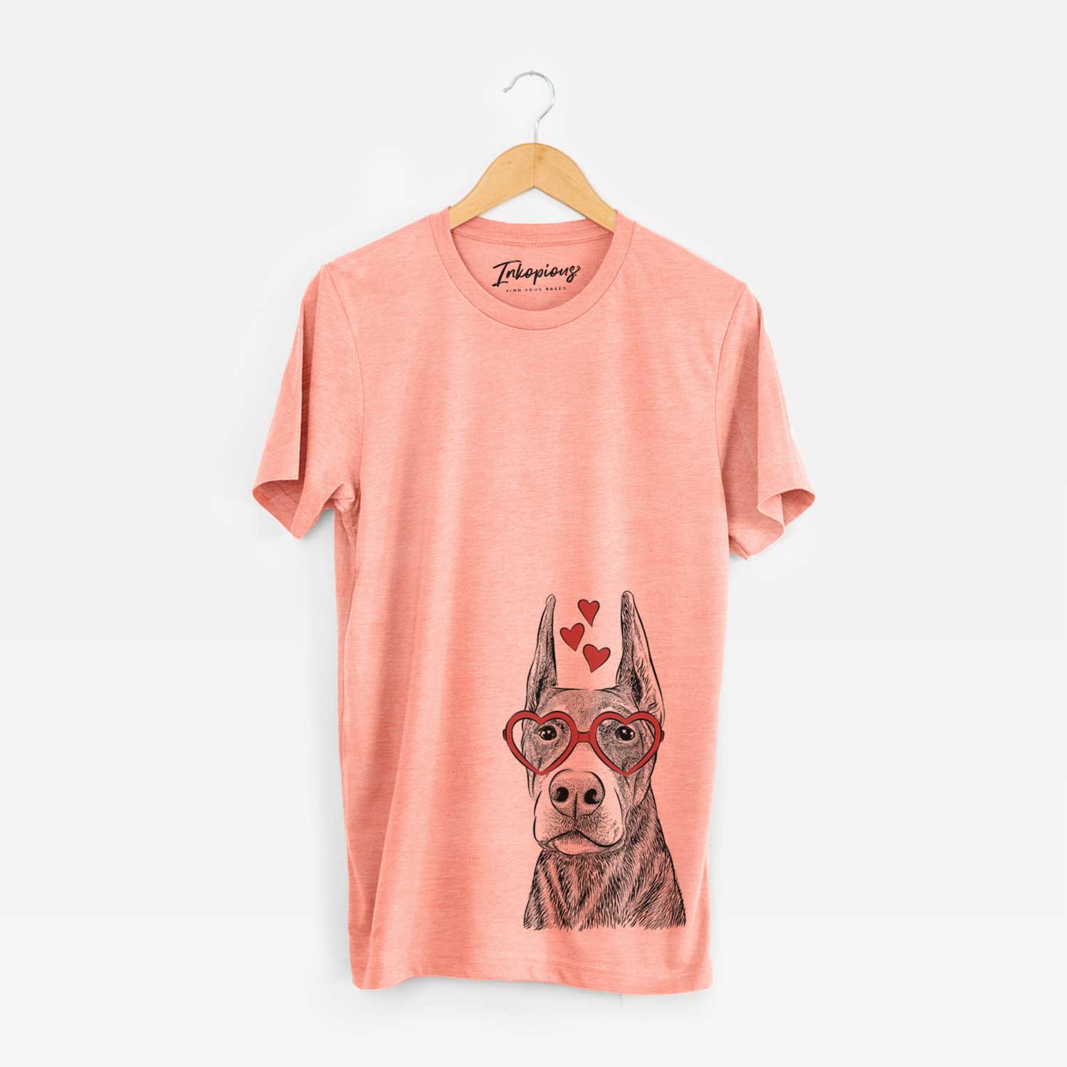 Hand-drawn sketch of Luna the Doberman Pinscher wearing heart-shaped glasses on a Sunset Unisex crewneck