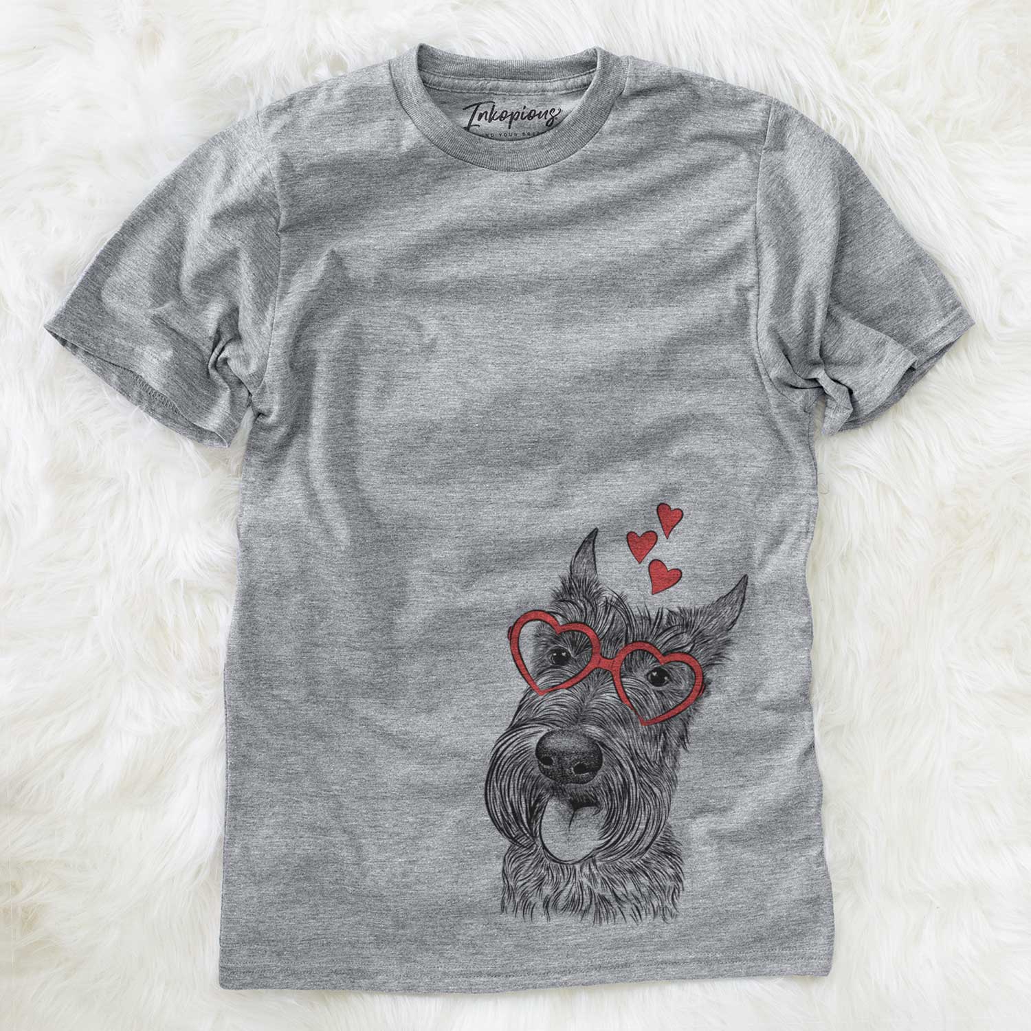 Hand-drawn sketch of Magnus the Scottish Terrier wearing heart-shaped glasses on a Grey Unisex crewneck