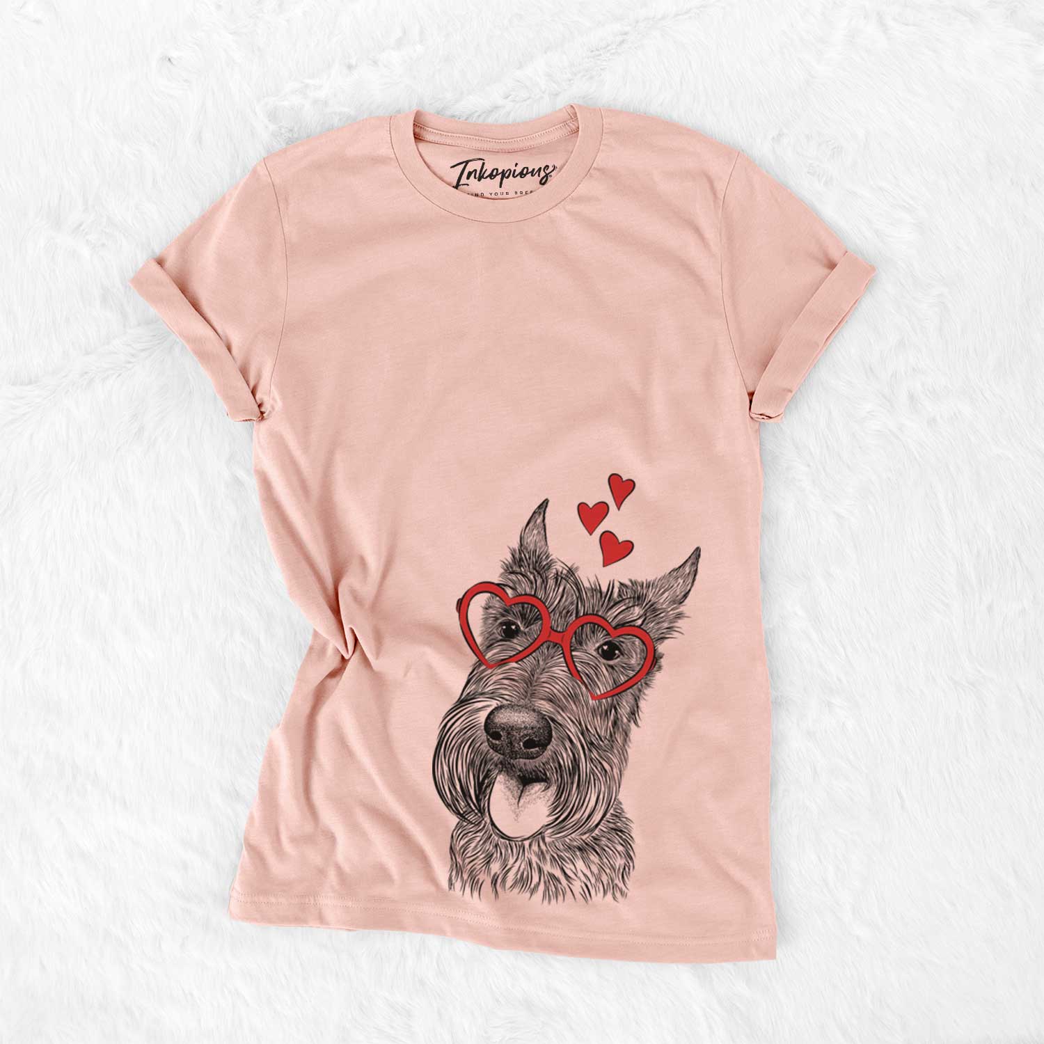 Hand-drawn sketch of Magnus the Scottish Terrier wearing heart-shaped glasses on a Peach Bella Canvas Unisex Crewneck