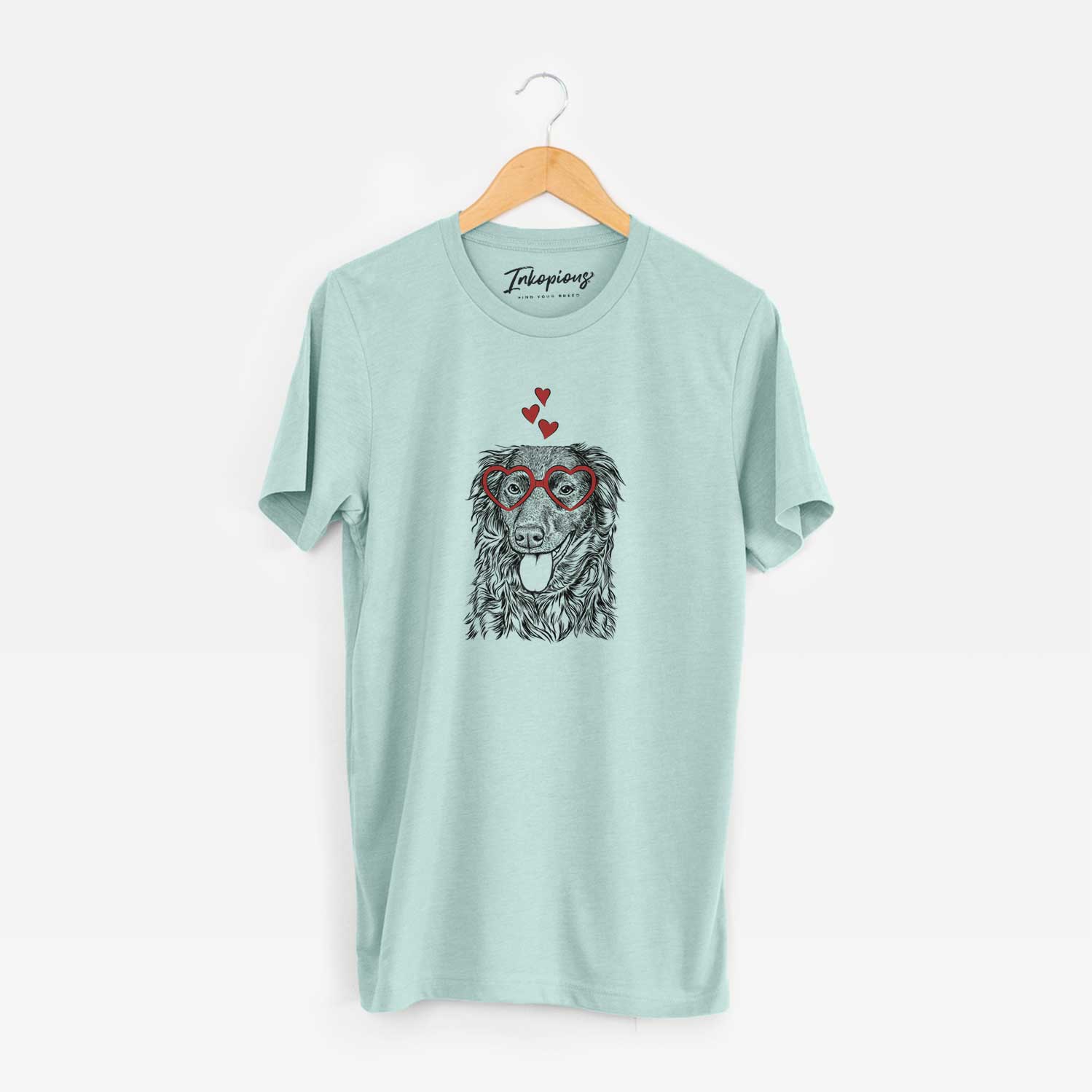 Hand-drawn sketch of Maisie Mae the Aussiedor wearing heart-shaped glasses on a Heather Sage Unisex crewneck