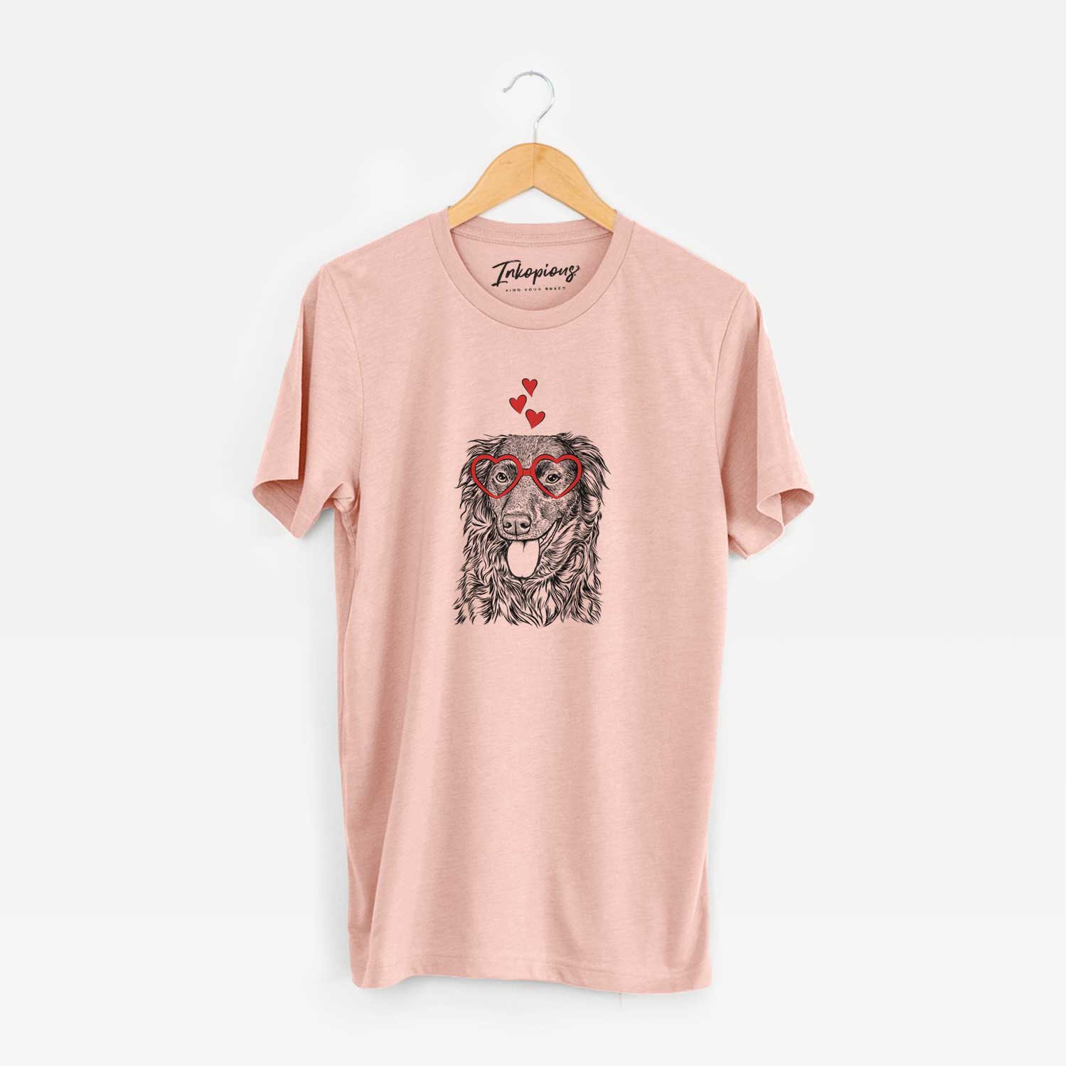 Hand-drawn sketch of Maisie Mae the Aussiedor wearing heart-shaped glasses on a Peach Unisex crewneck