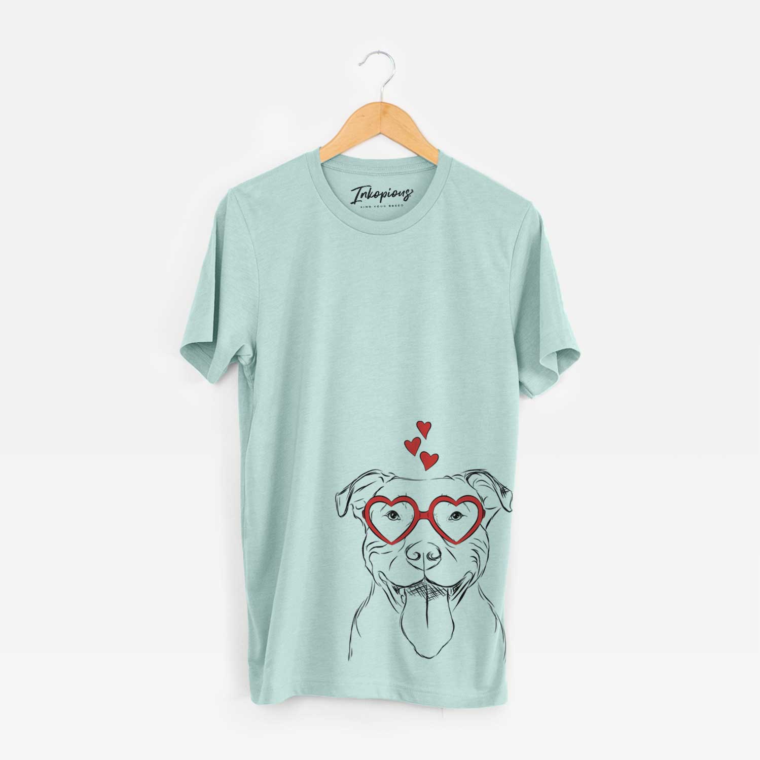 Hand-drawn sketch of Major the Pitbull wearing heart-shaped glasses on a Heather Sage Bella Canvas Unisex Crewneck