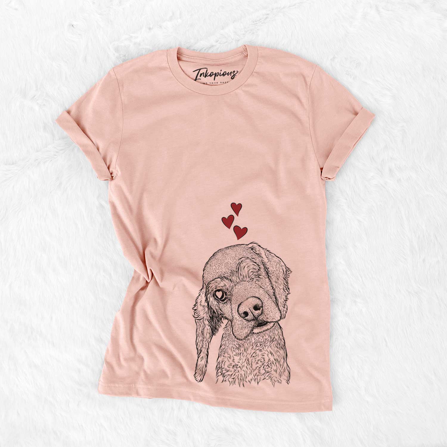 Hand-drawn sketch of Mambo #5 the Cocker Spaniel wearing heart-shaped glasses on a Peach Bella Canvas Unisex Crewneck