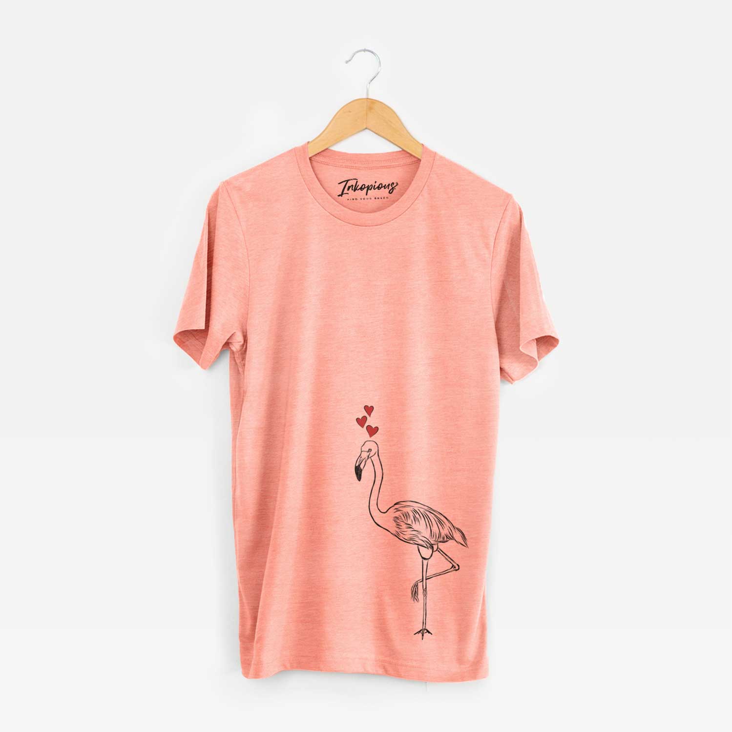 Hand-drawn sketch of Mango the Flamingo wearing heart-shaped glasses on a Sunset Unisex crewneck