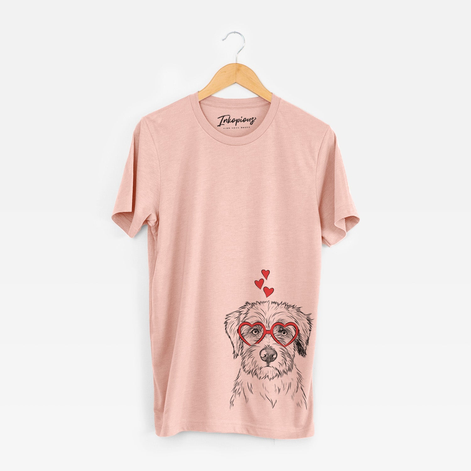 Hand-drawn sketch of Marek the Bernedoodle wearing heart-shaped glasses on a Peach Unisex crewneck