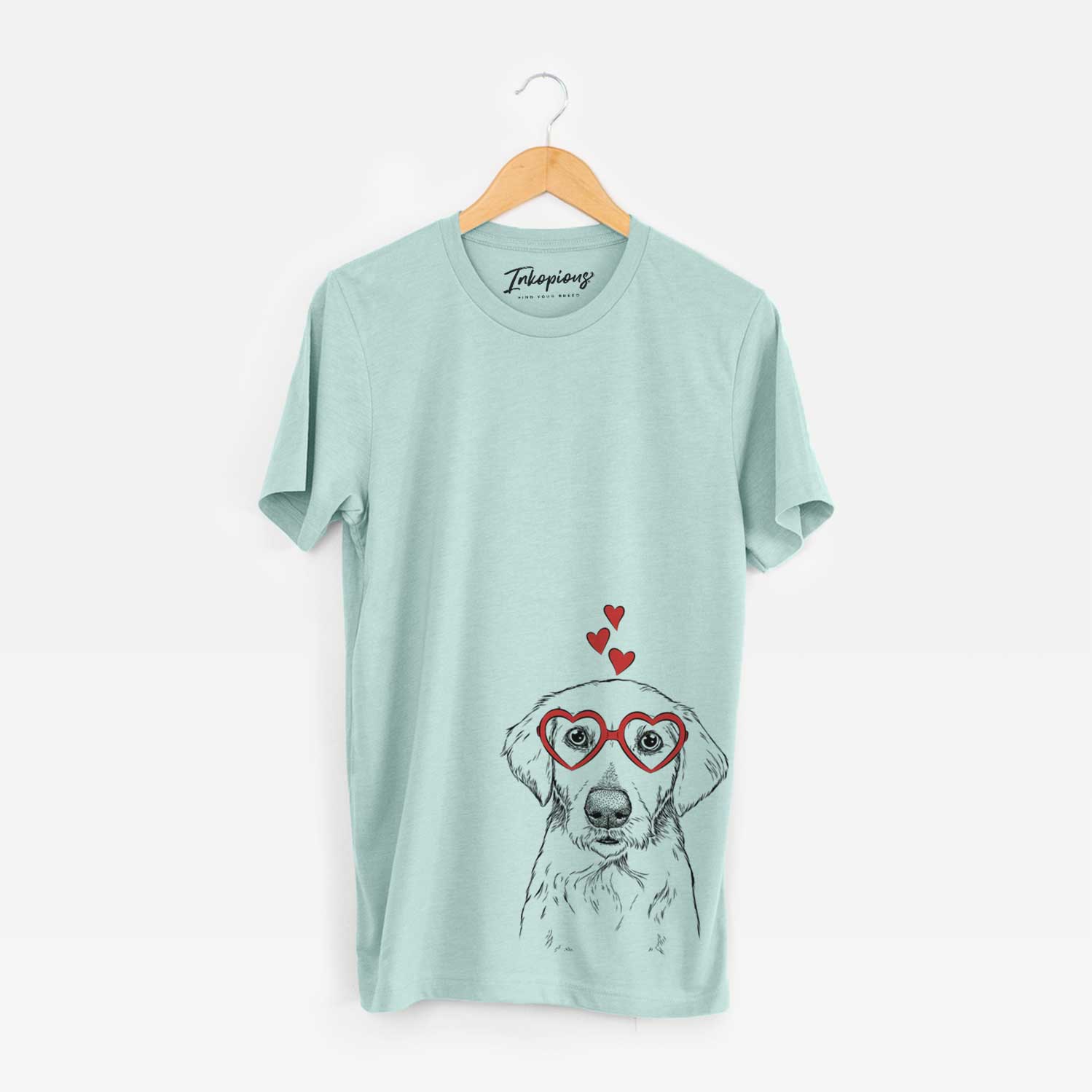 Hand-drawn sketch of Marley Sue the Labradoodle wearing heart-shaped glasses on a Heather Sage Unisex crewneck