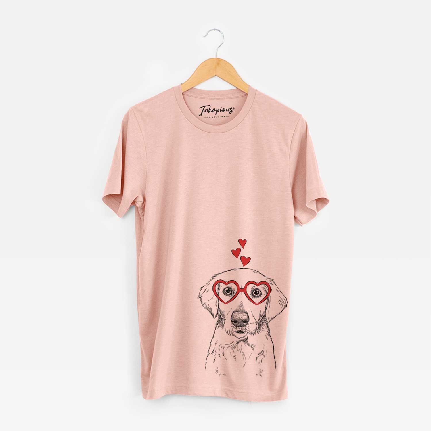 Hand-drawn sketch of Marley Sue the Labradoodle wearing heart-shaped glasses on a Peach Unisex crewneck