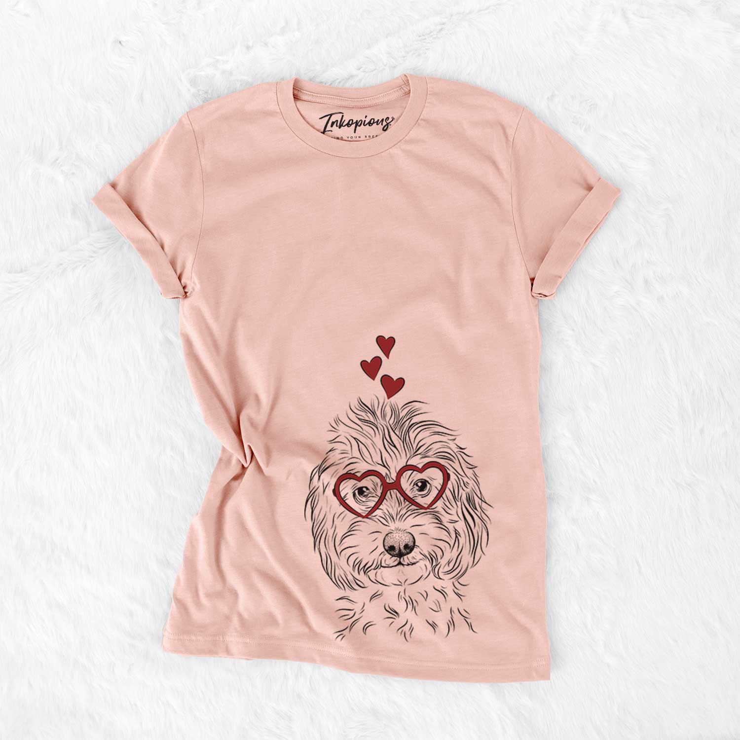 Hand-drawn sketch of Mason the Cavapoo wearing heart-shaped glasses on a Peach Bella Canvas Unisex Crewneck