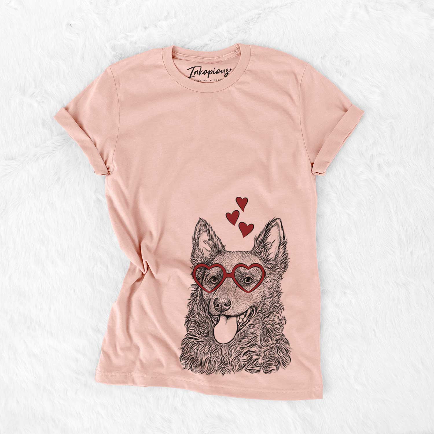 Hand-drawn sketch of Maximo the Mudi wearing heart-shaped glasses on a Peach Bella Canvas Unisex Crewneck