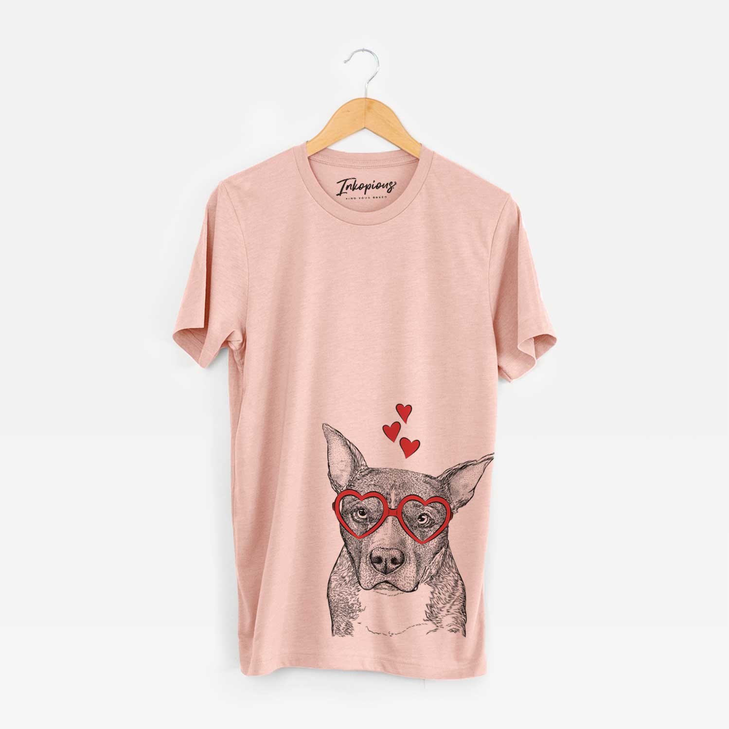 Hand-drawn sketch of Mercy the Pitbull wearing heart-shaped glasses on a Peach Unisex crewneck