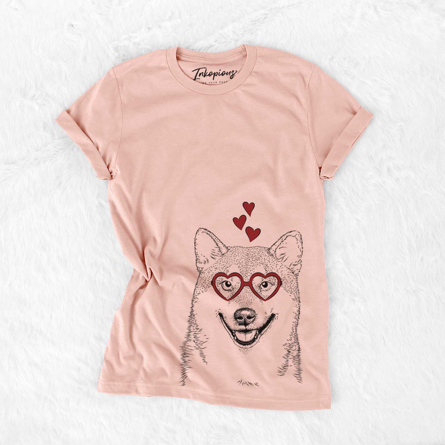 Hand-drawn sketch of Mitsu the Shiba Inu wearing heart-shaped glasses on a Peach Bella Canvas Unisex Crewneck