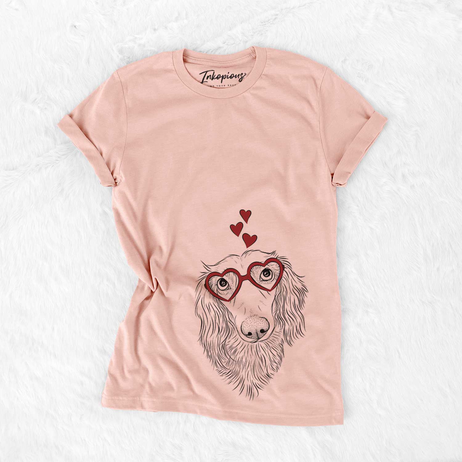 Hand-drawn sketch of Mr. Rusty the Long Haired Dachshund wearing heart-shaped glasses on a Peach Bella Canvas Unisex Crewneck