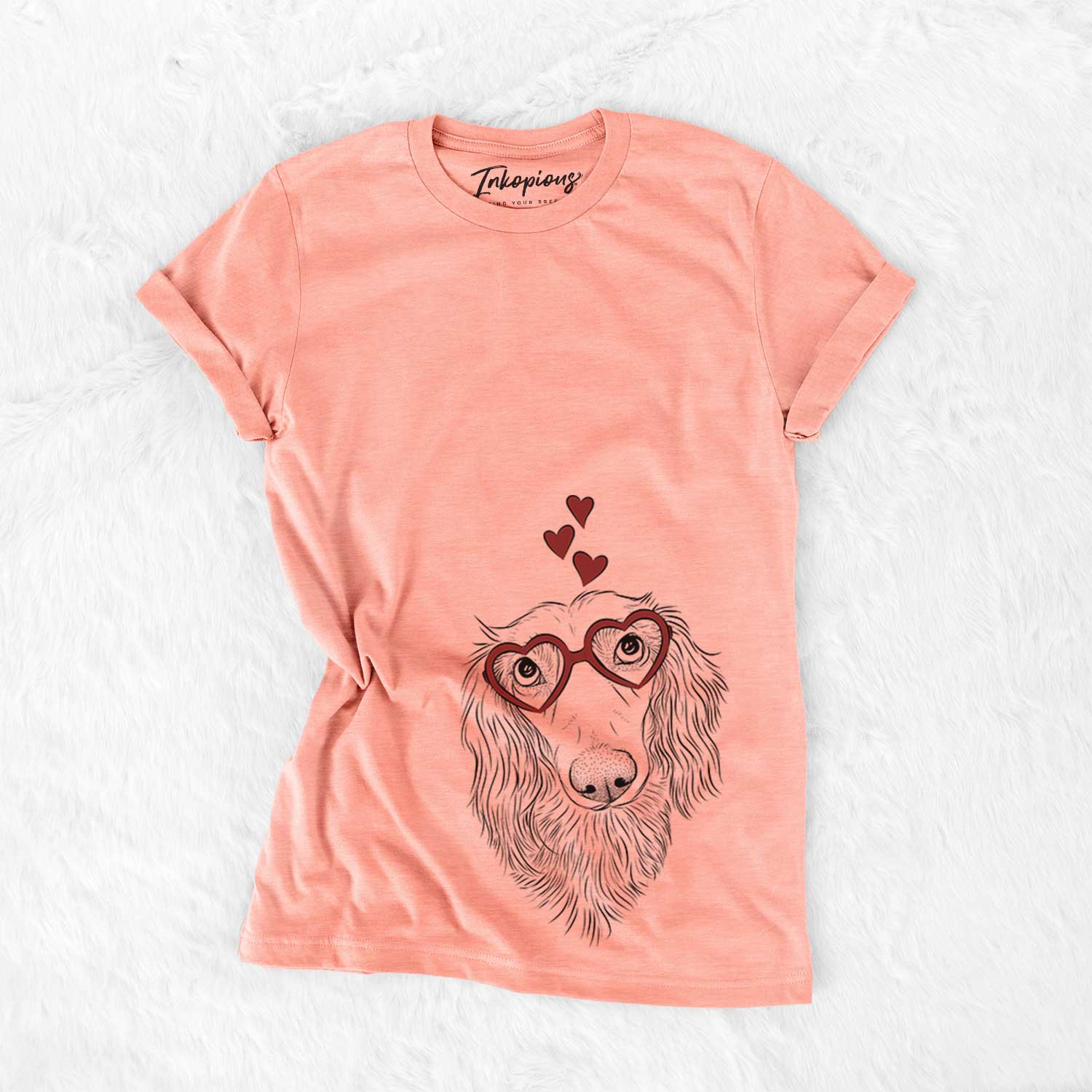 Hand-drawn sketch of Mr. Rusty the Long Haired Dachshund wearing heart-shaped glasses on a Sunset Bella Canvas Unisex Crewneck