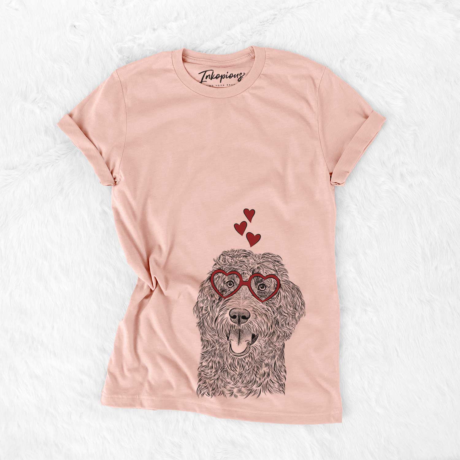 Hand-drawn sketch of Murr Dog the Labradoodle wearing heart-shaped glasses on a Peach Bella Canvas Unisex Crewneck