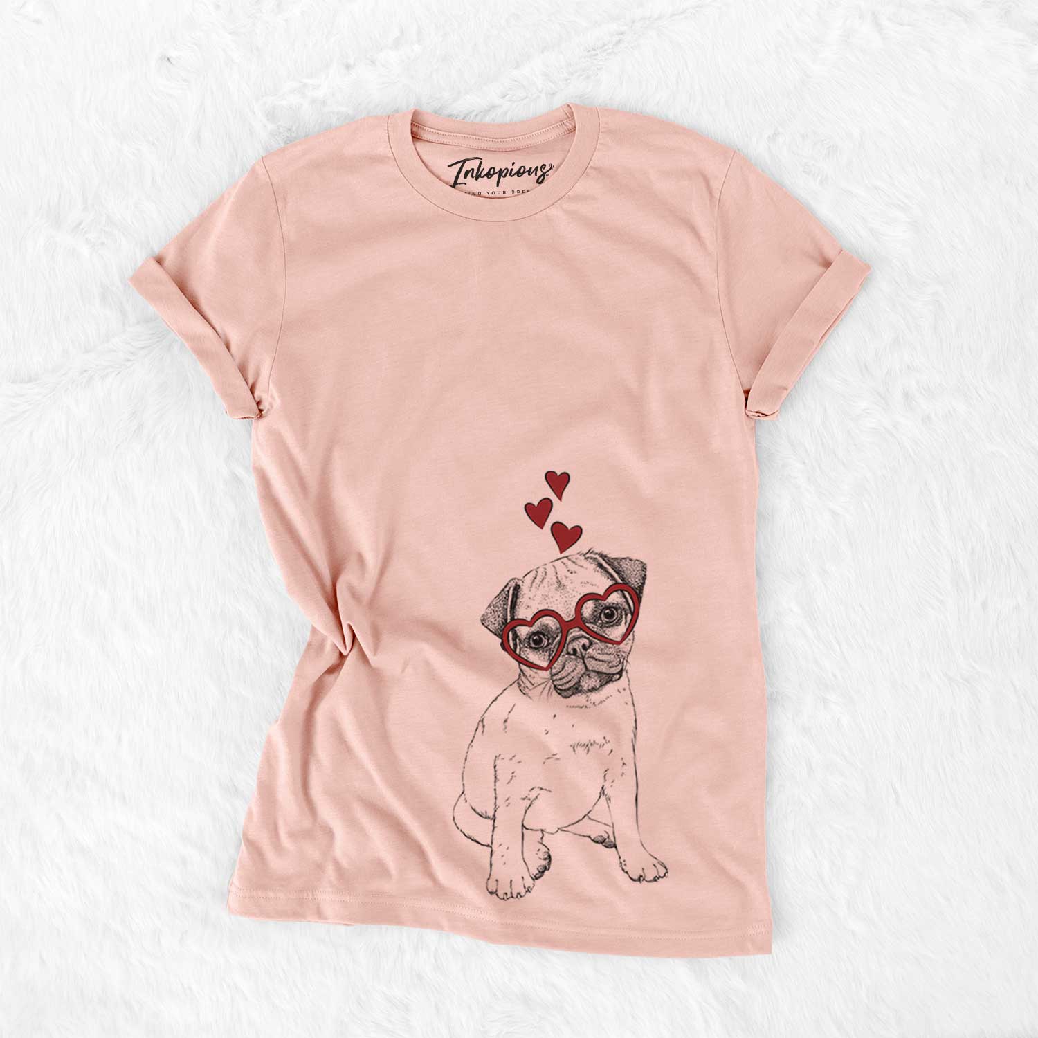 Hand-drawn sketch of Nelson the Pug Puppy wearing heart-shaped glasses on a Peach Bella Canvas Unisex Crewneck