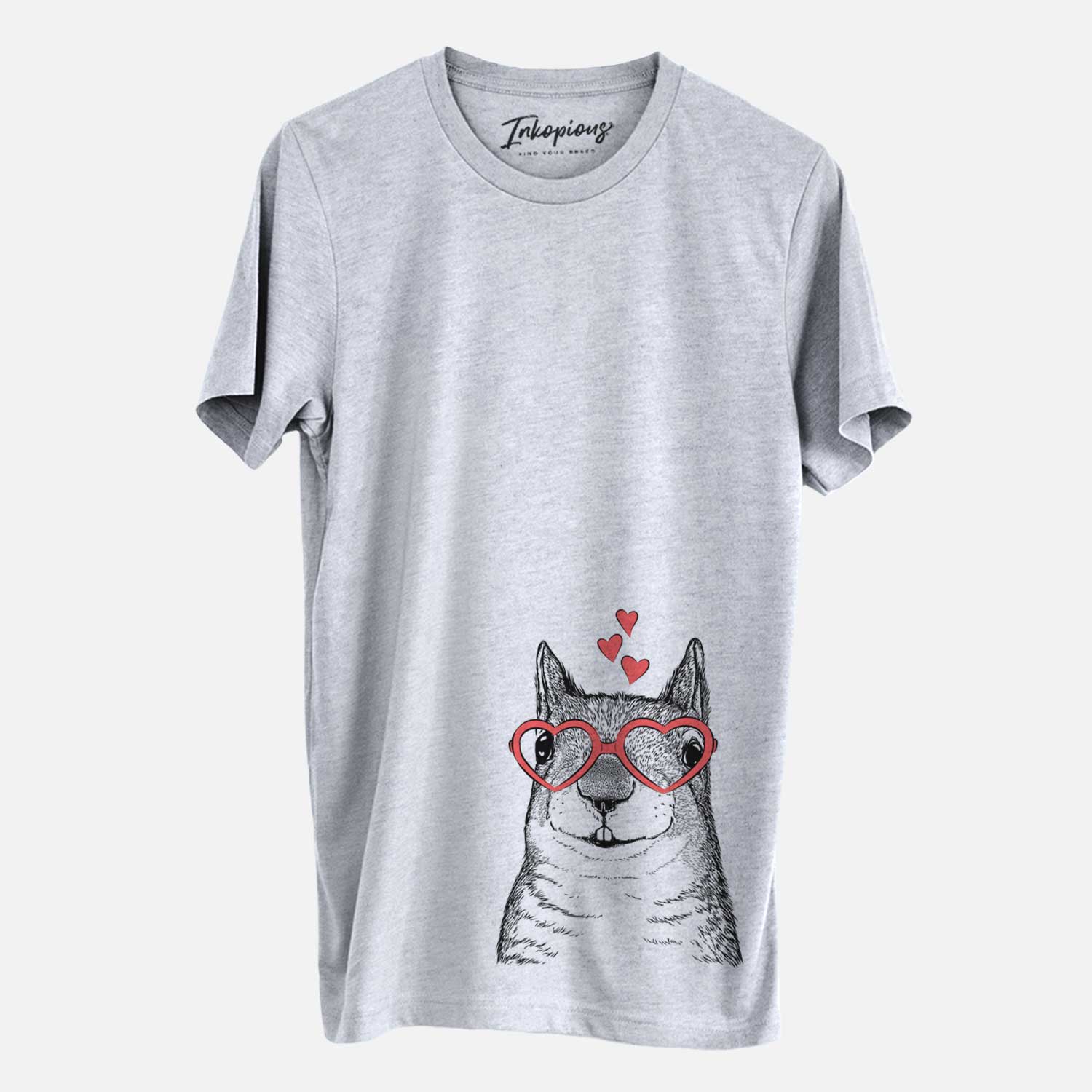Hand-drawn sketch of Nibbles the Squirrel wearing heart-shaped glasses on a Grey Unisex crewneck