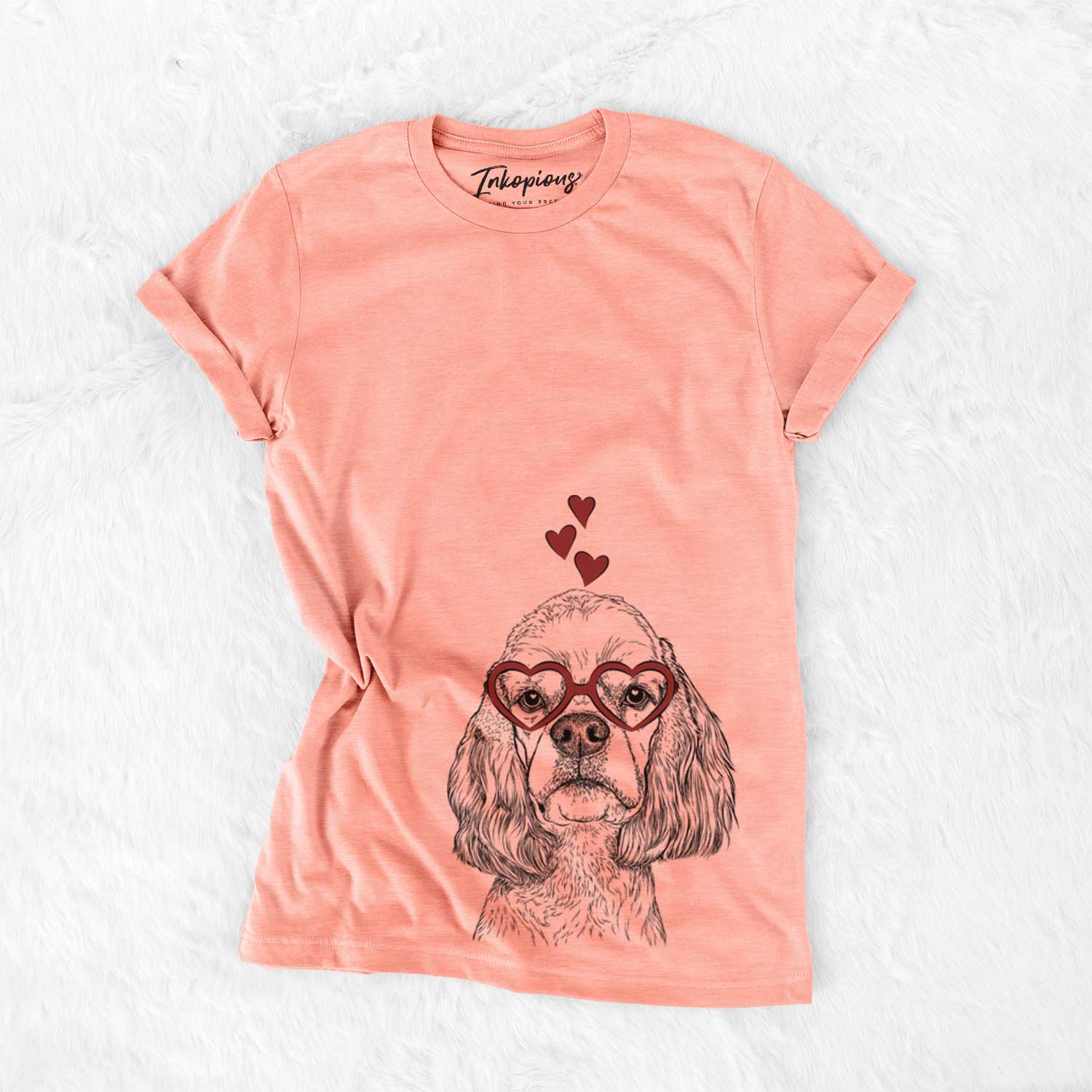 Hand-drawn sketch of Oakley the American Cocker Spaniel wearing heart-shaped glasses on a Sunset Bella Canvas Unisex Crewneck