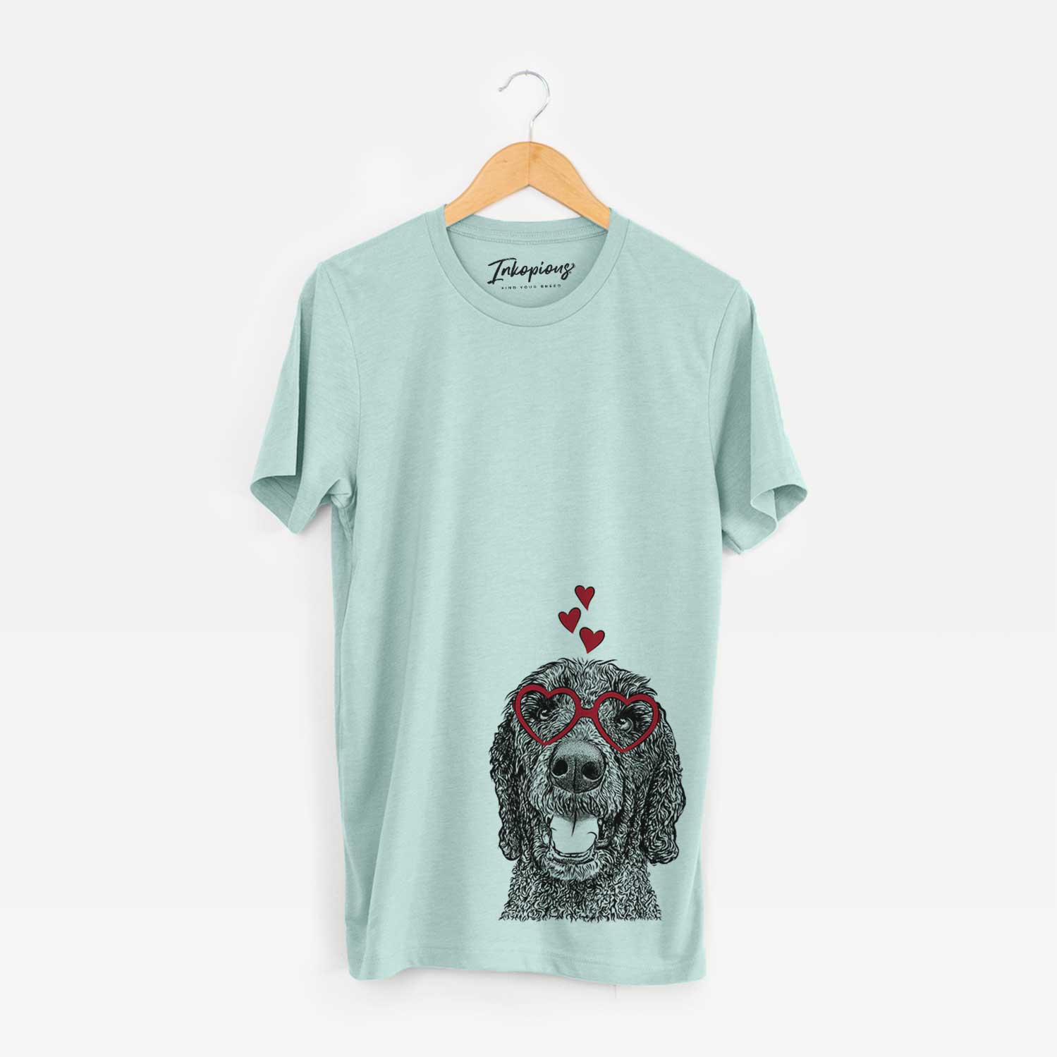 Hand-drawn sketch of Obi James the Goldendoodle wearing heart-shaped glasses on a Heather Sage Bella Canvas Unisex Crewneck