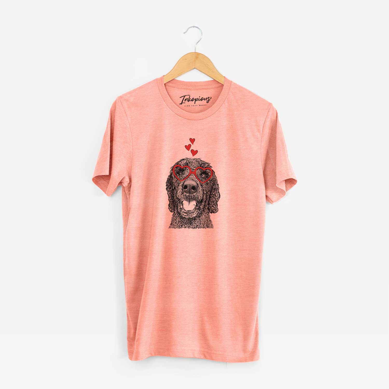 Hand-drawn sketch of Obi James the Goldendoodle wearing heart-shaped glasses on a Sunset Unisex crewneck