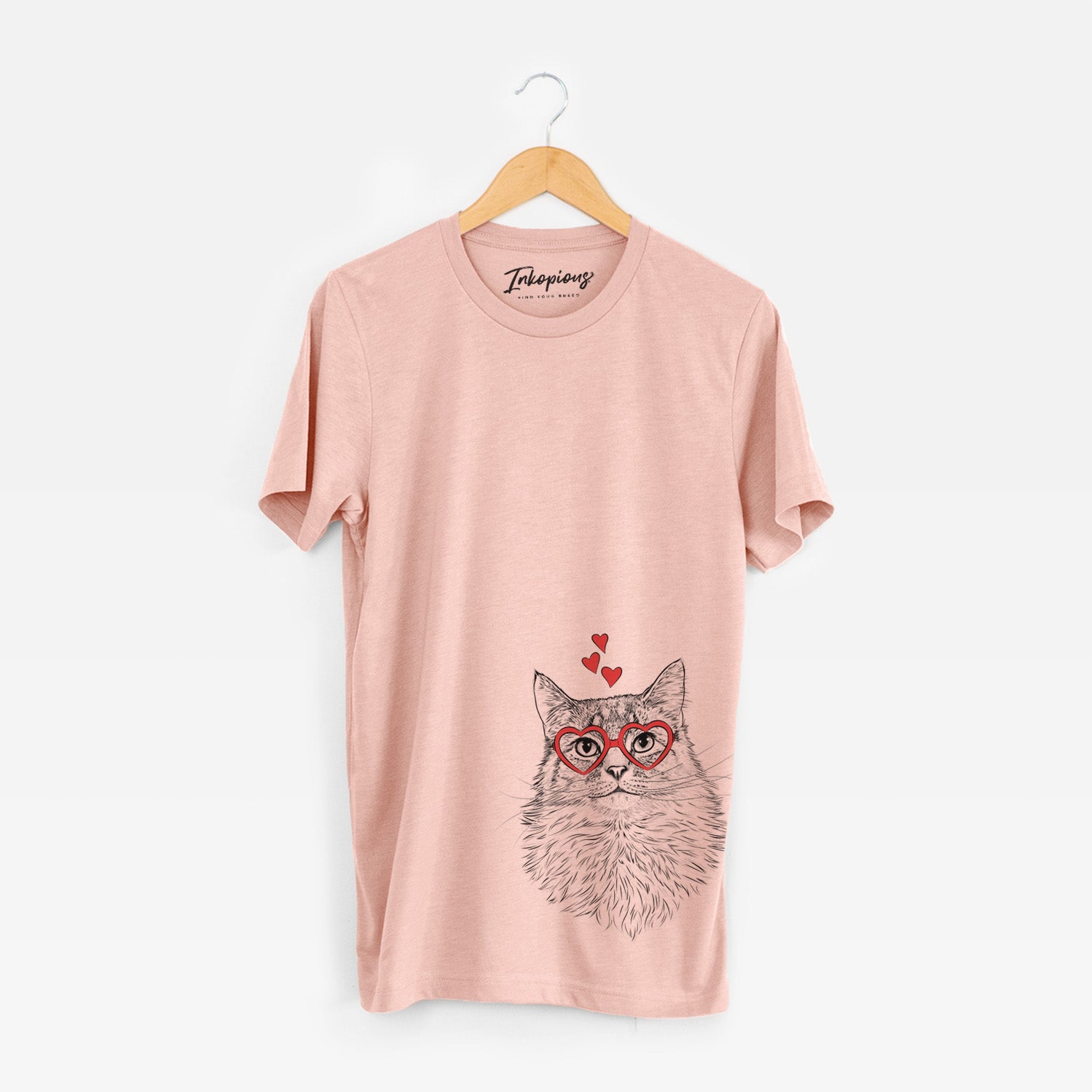 Hand-drawn sketch of Olive the Cat wearing heart-shaped glasses on a Peach Unisex crewneck
