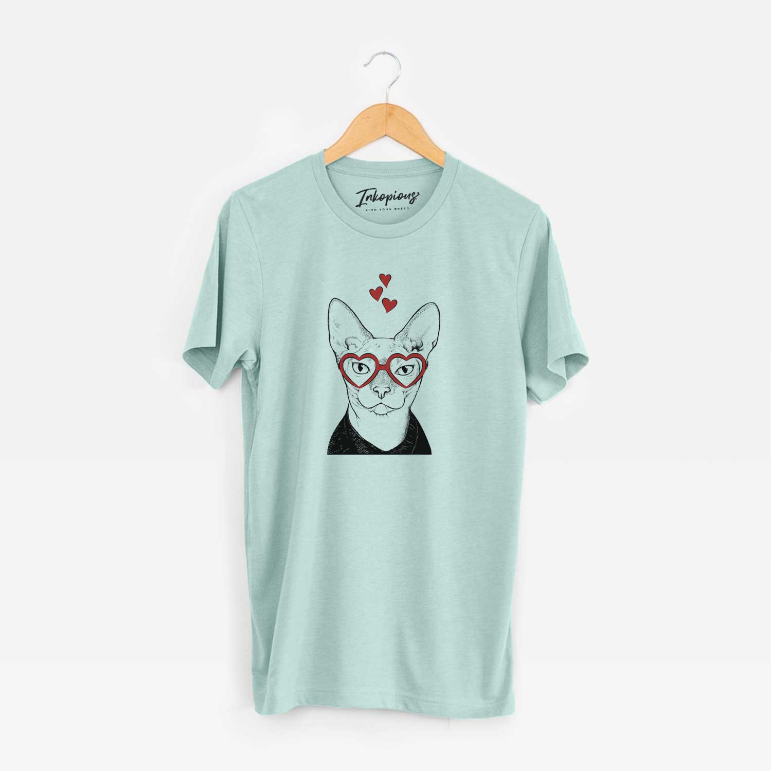 Hand-drawn sketch of Oliver Watson the Sphynx Cat wearing heart-shaped glasses on a Heather Sage Unisex crewneck