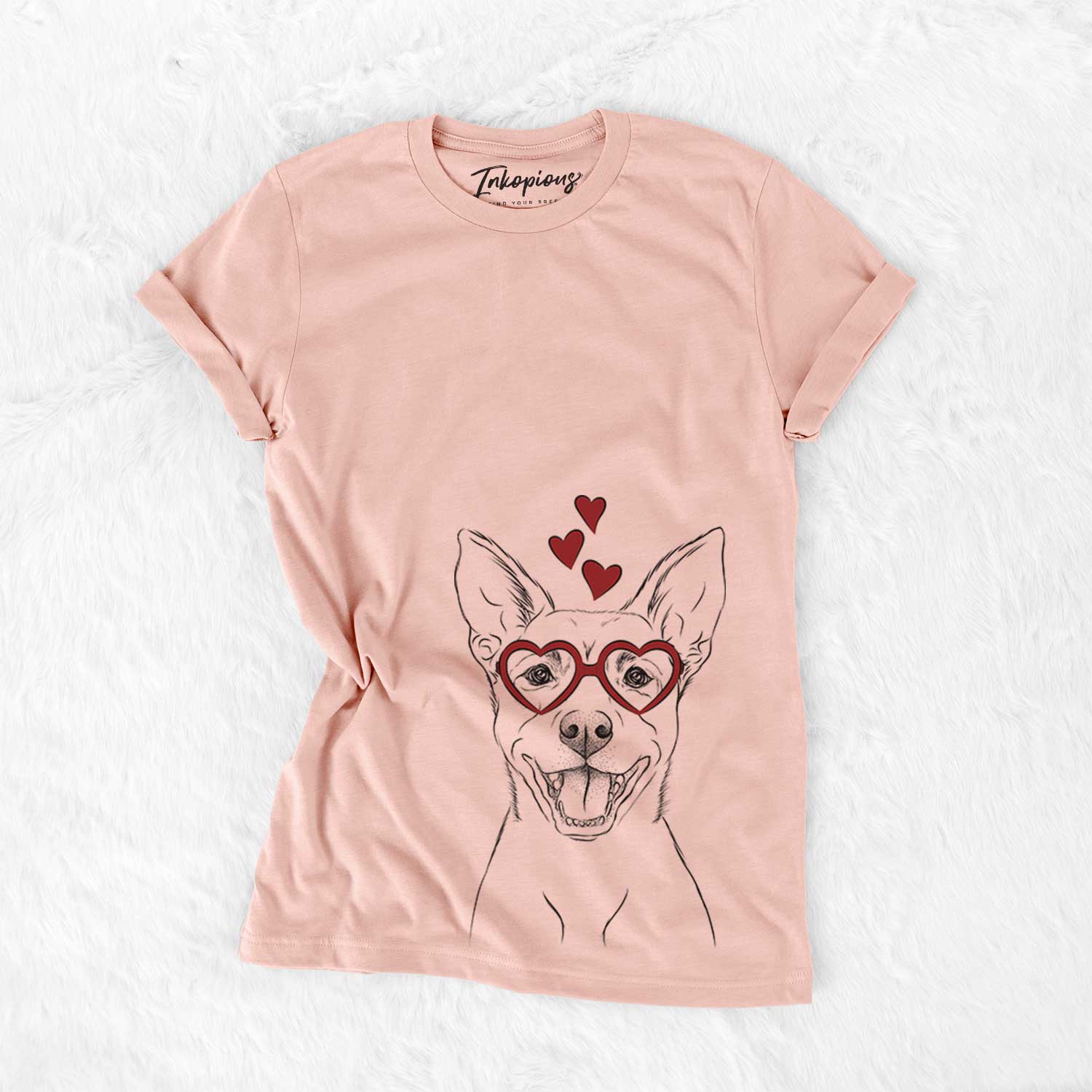 Hand-drawn sketch of Orange the Carolina Dog wearing heart-shaped glasses on a Peach Bella Canvas Unisex Crewneck