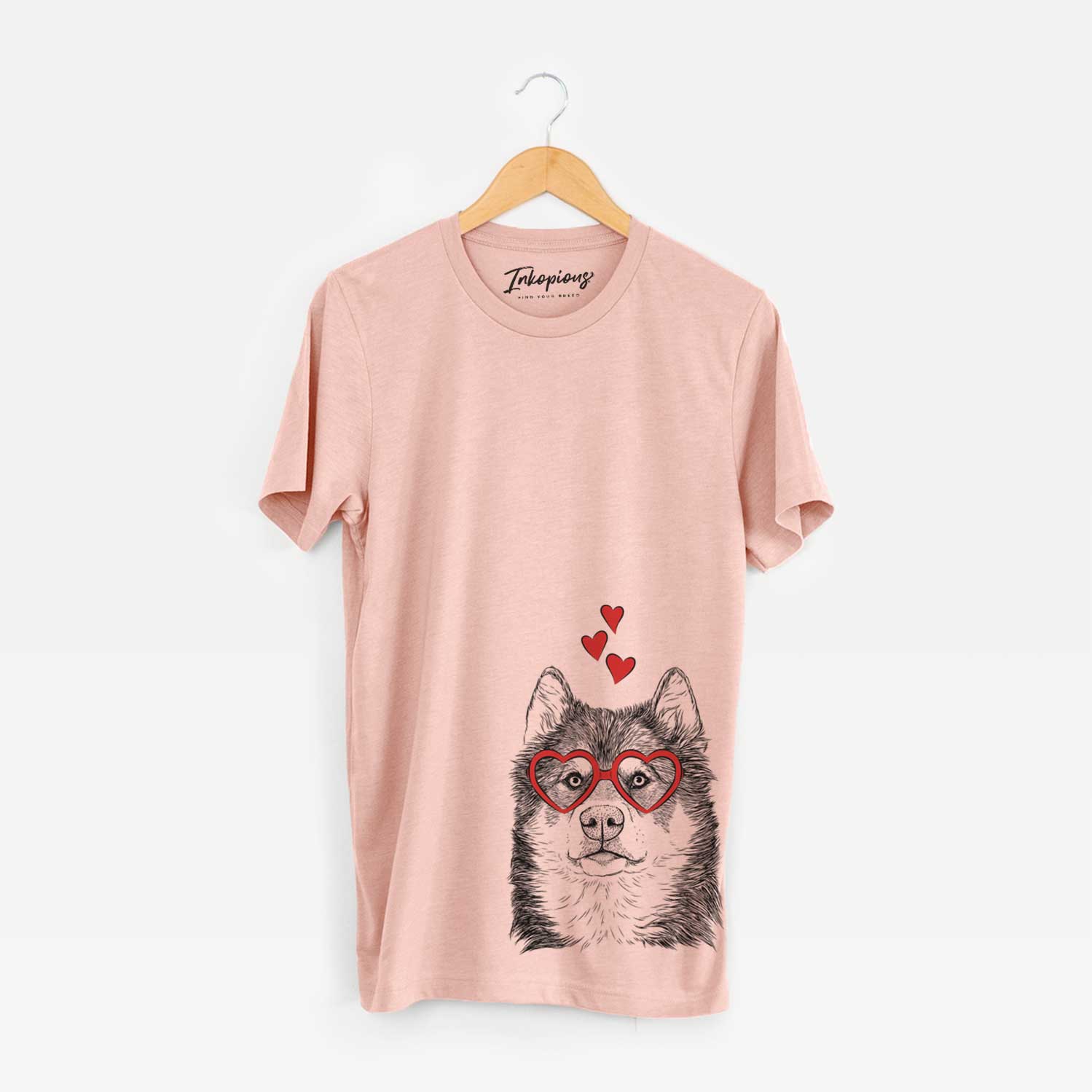 Hand-drawn sketch of Oskar the Canadian Eskimo Dog wearing heart-shaped glasses on a Peach Unisex crewneck